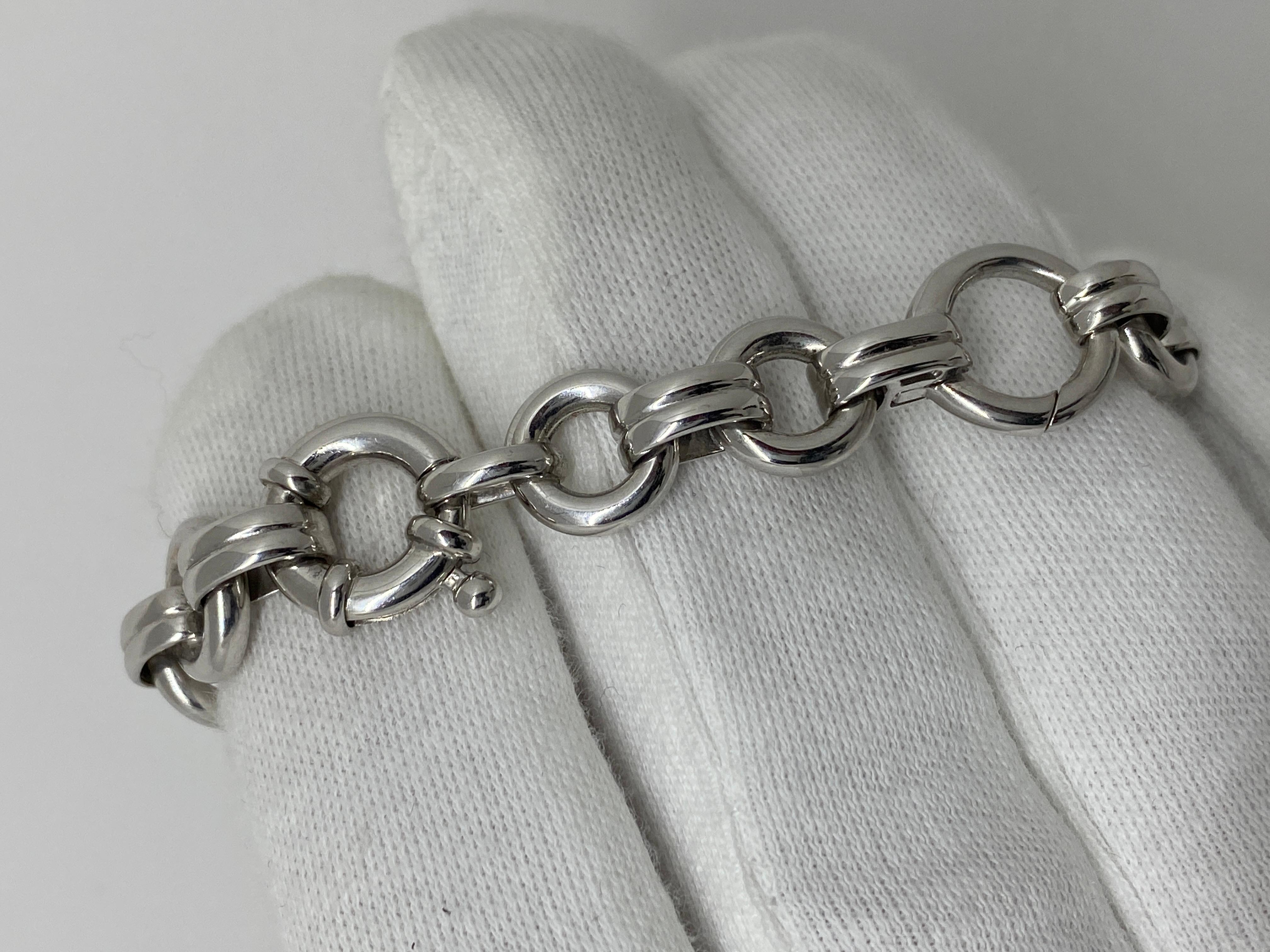 Aaron Basha signed Bracelet made of White Gold with 5 rings for Pendants

Welcome to our jewelry collection, where every piece tells a story of timeless elegance and unparalleled craftsmanship. As a family-run business in Italy for over 100 years,