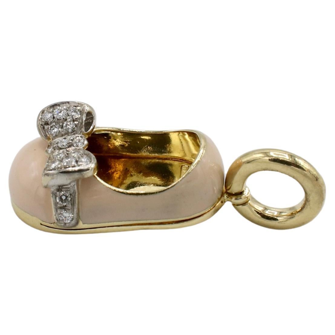 Aaron Basha Baby Shoe 18 Karat Yellow Gold  Pink Enamel & Natural Diamond Bow Charm
Metal: 18k yellow gold
Weight: 5.58 grams
Length: 1 inch (to top of bale)
Bale opening: 0.25 inches
Diamonds: Approx. 0.18 CTW G VS round natural diamonds
SON
