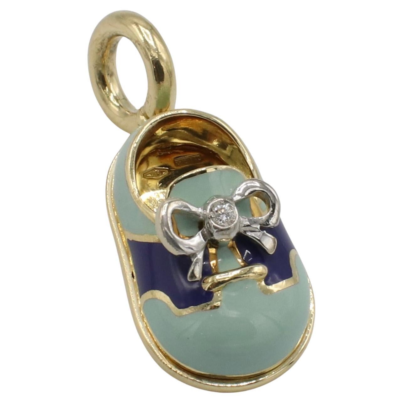 Aaron Basha Baby Shoe 18Kt Yellow Gold Blue Enamel & Natural Diamond Bow Charm 
Metal: 18k yellow gold
Weight: 7.13 grams
Length: 1 inch (to top of bale)
Bale opening: 0.25 inch
Diamond: Approx. 0.01 carat G VS natural diamond
SON F35000088
