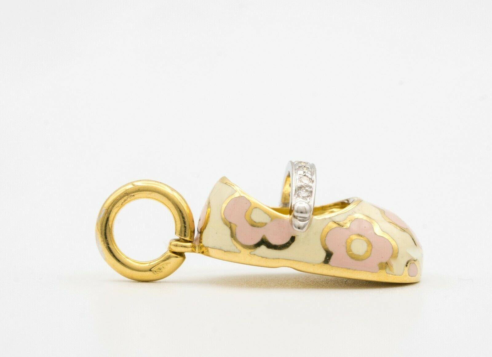 Original Aaron Basha 18K yellow gold, enamel and diamond pink clover floral design shoe charm with small round diamonds featured on strap.

Stamped with signature, AB initials and 750 .
Original Retail: $2600
Chain and original packaging is not