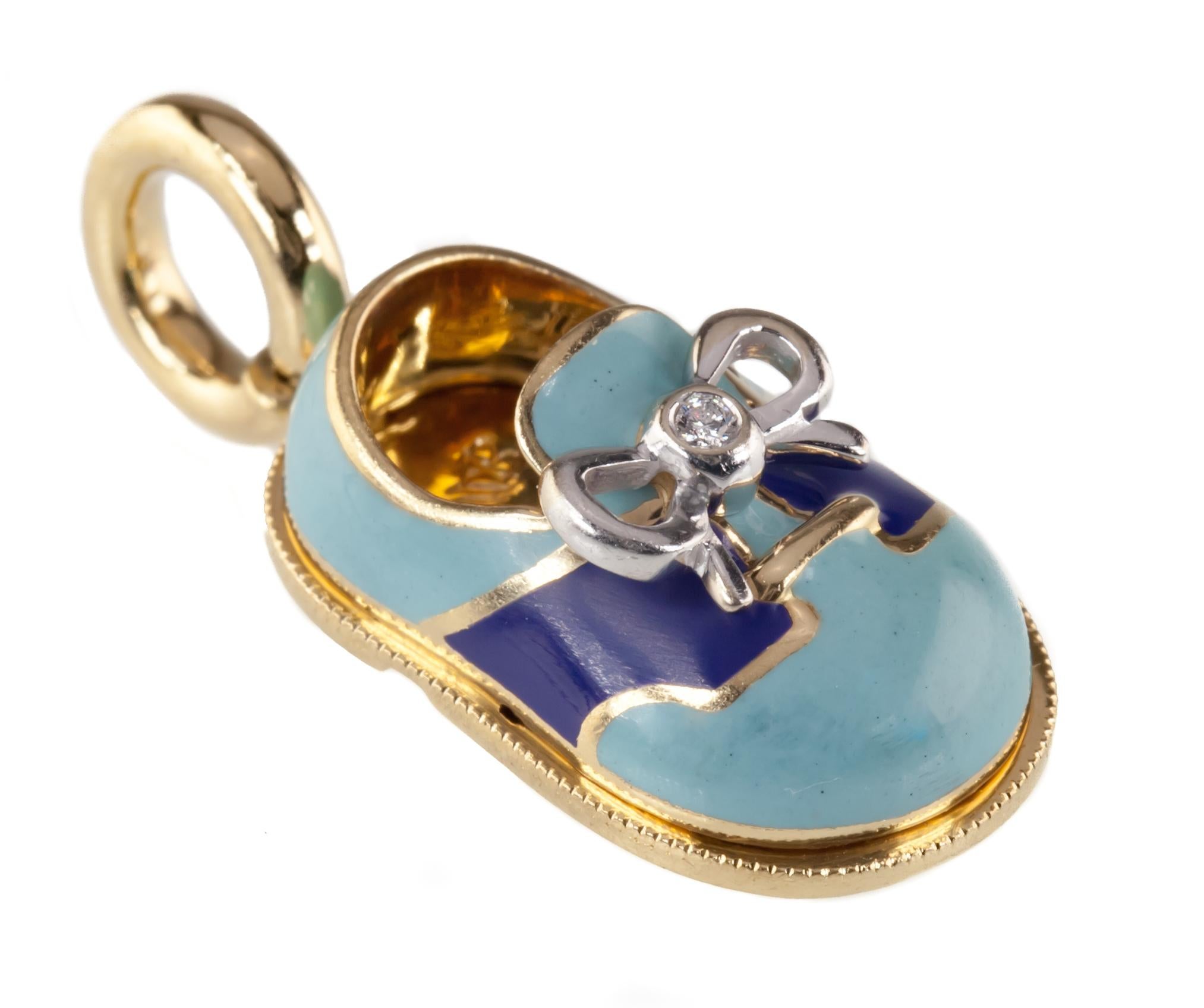 Gorgeous Aaron Basha Boy's Shoe Pendant
Features Light and Dark Blue Enamel with Diamond Accent on Tied Shoelaces
TDW = 0.01 Ct, F Color, SI1 Clarity
Total Mass = 7.4 grams
Length of pendant = 27 mm (Including Bail)
Width of pendant = 12 mm
Gorgeous
