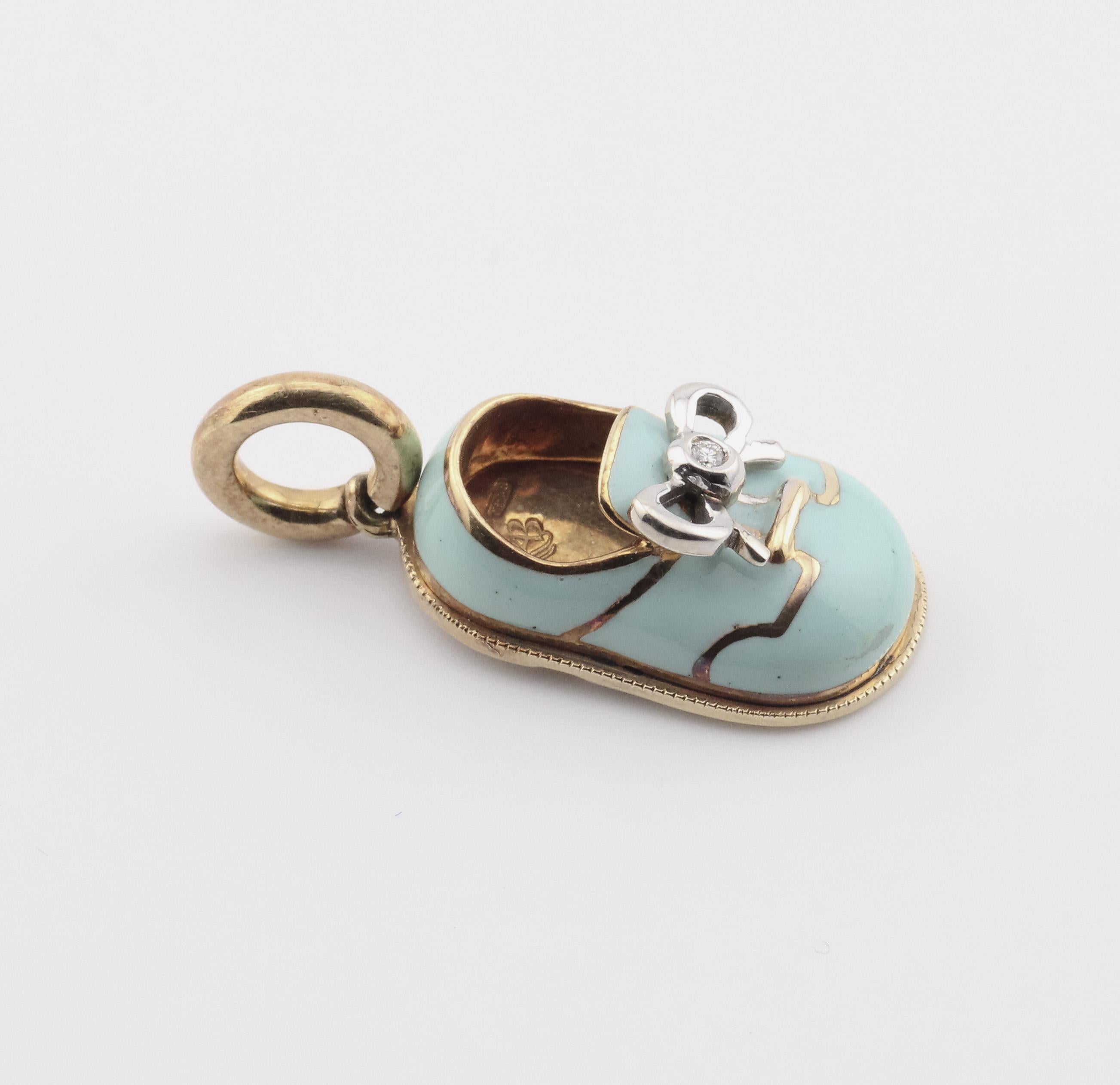 Introducing the Aaron Basha Diamond 18K Yellow Gold Tiffany Blue Enamel Baby Shoe Charm Pendant—a whimsical and sentimental treasure that combines luxury with playful elegance. Crafted by the renowned designer Aaron Basha, this charming pendant