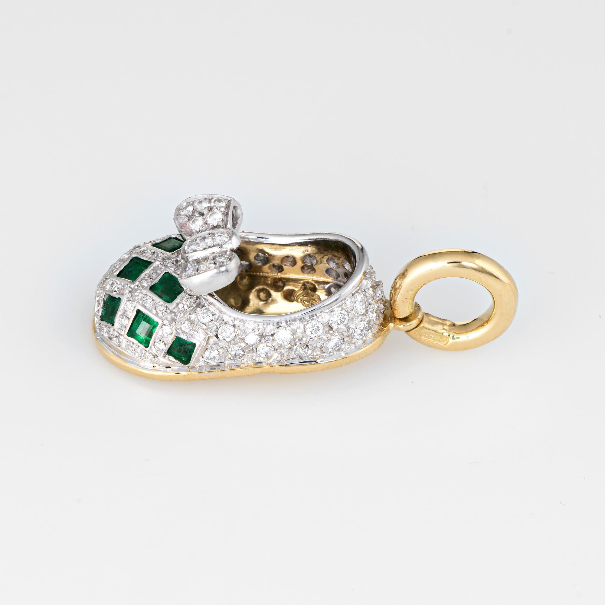 Finely detailed pre owned Aaron Basha gemstone shoe charm crafted in 18k yellow & white gold.  

Round brilliant cut diamonds are pave set into the shoe and total an estimated 0.68 carats (estimated at H-I color and VS2-SI1 clarity). 10 emeralds