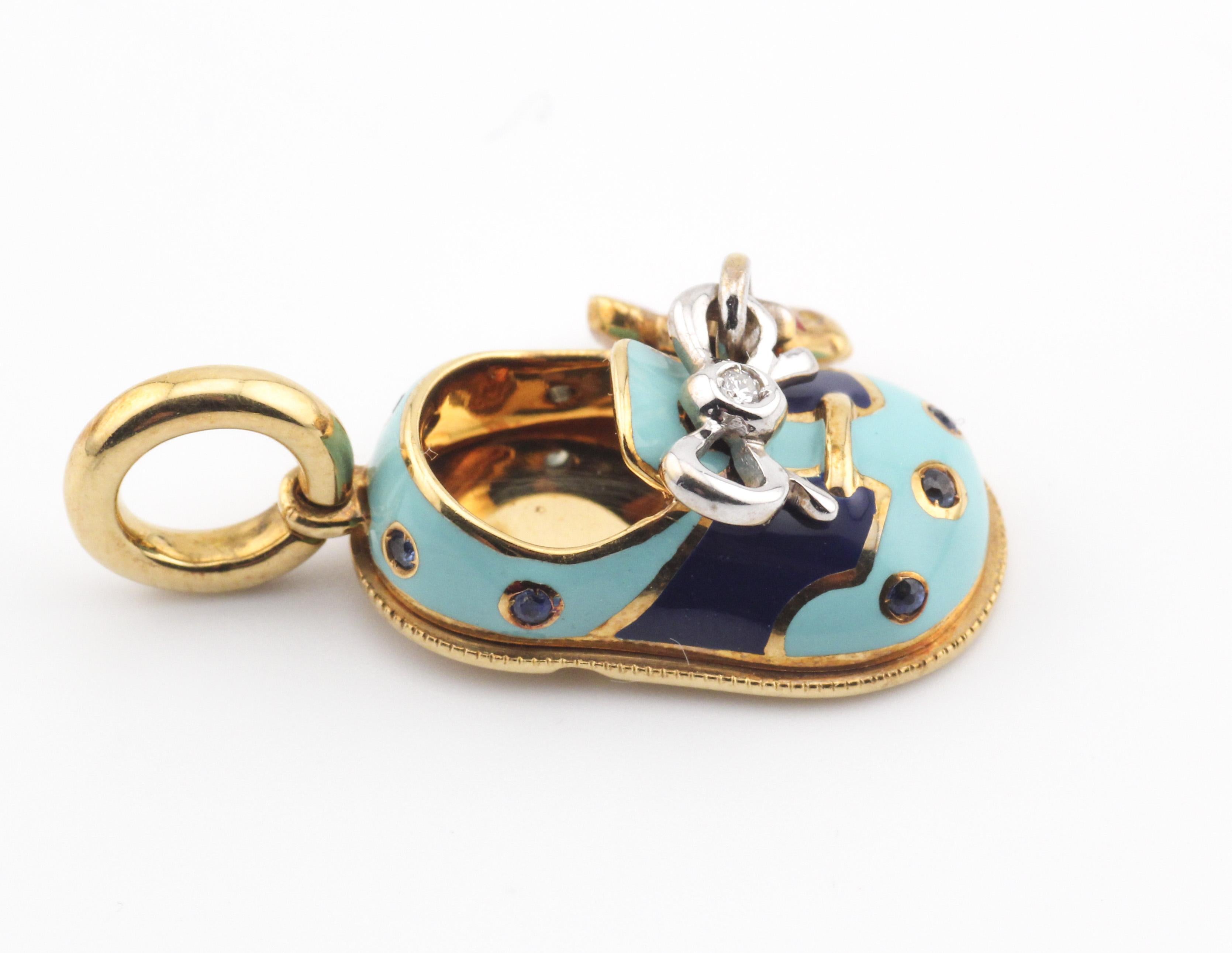 Embark on a whimsical journey with the Aaron Basha 18K Yellow Gold and Blue Enamel Baby Shoe Charm Pendant, a delightful fusion of luxury and playful charm. This enchanting piece is a celebration of life's precious moments, expertly crafted to