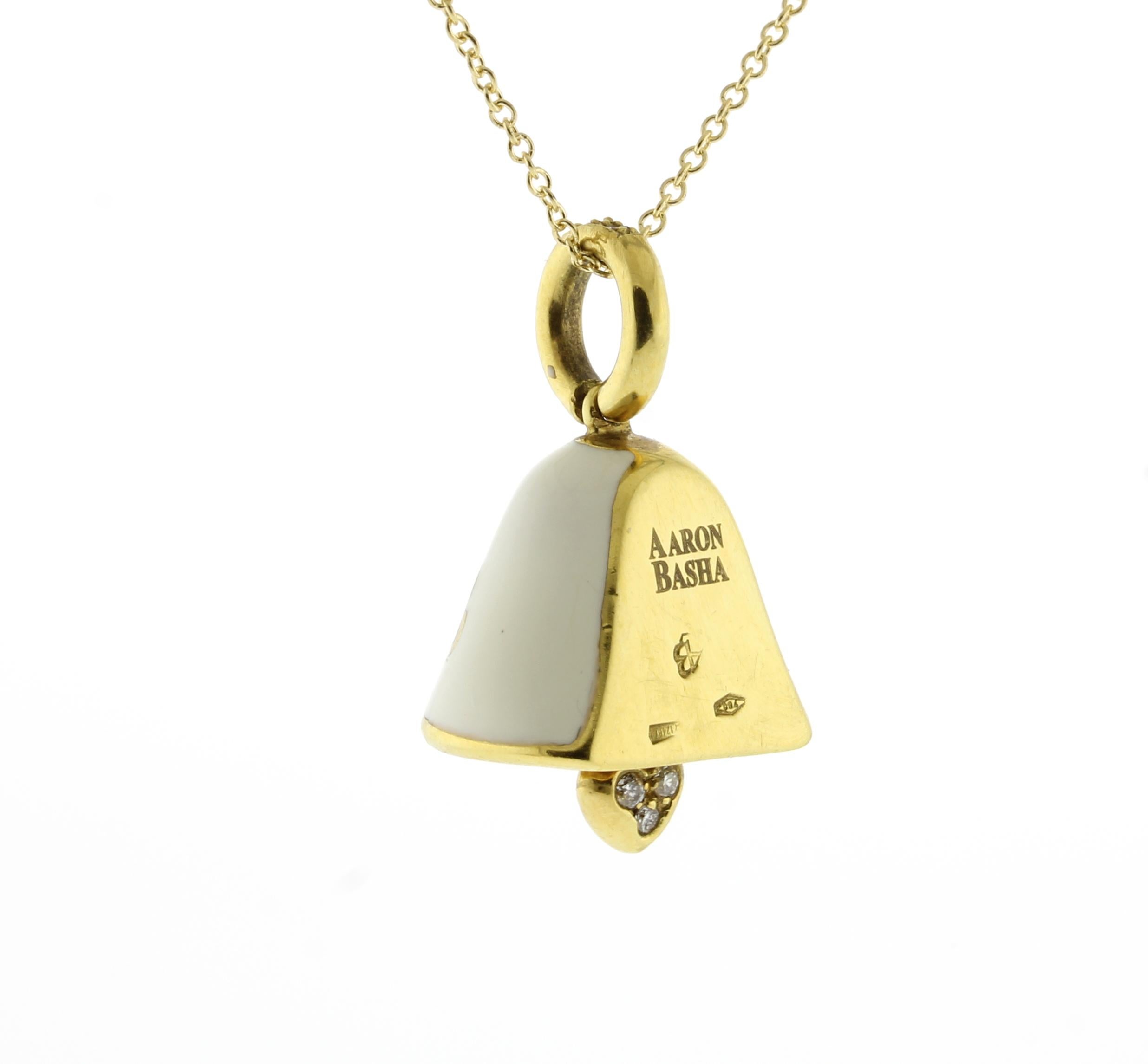 From Aaron Basha’s charm collection, a white with red hearts enamel bell.
• Designer: Aaron Basha	
• Metal: 18 karat gold
• Circa: Early 2000s
• Size: 1 inch high, 16 inch gold chain 
• Packaging: Pampillonia presentation box
• Condition: Excellent

