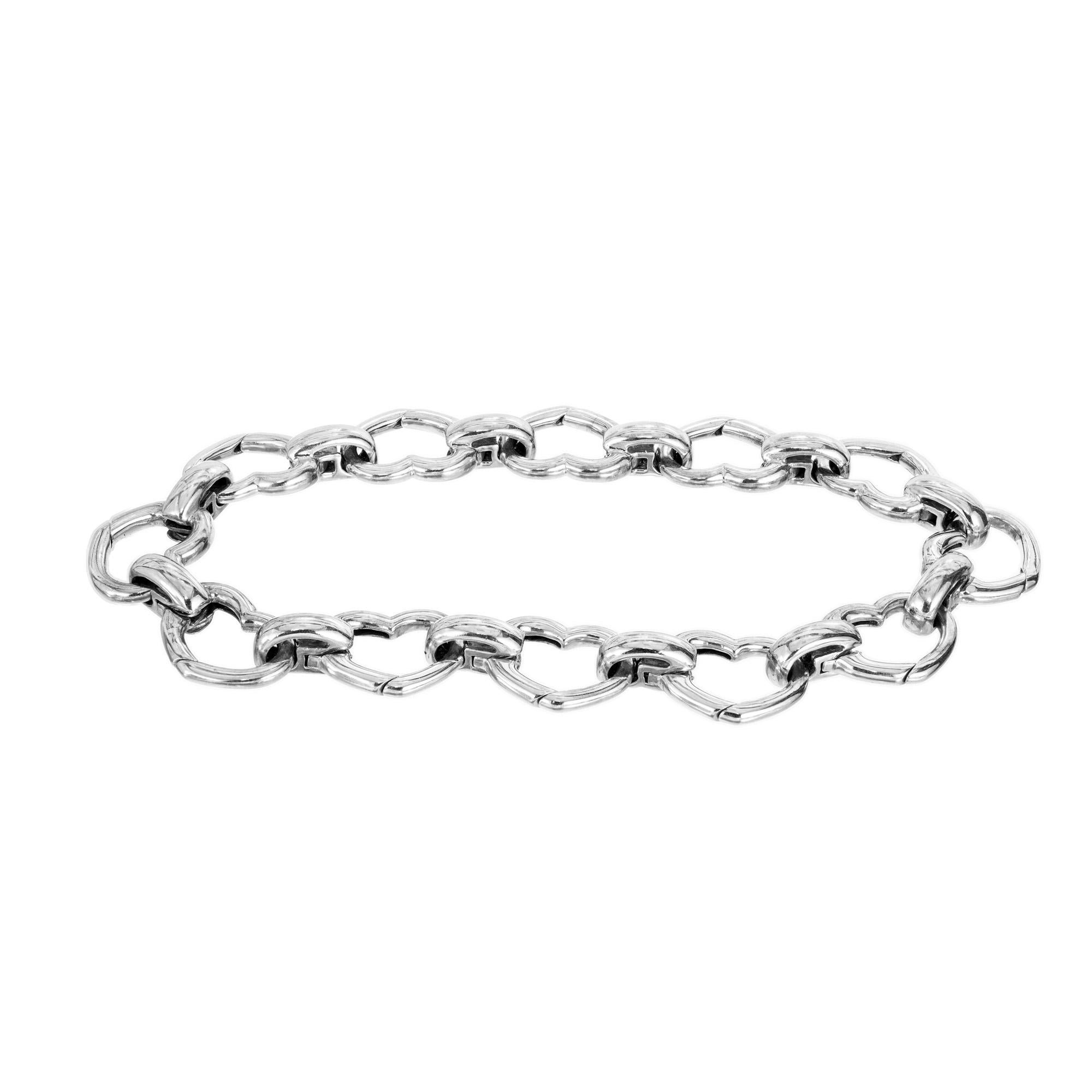 Aaron Basha Heart Shape Gold Link Bracelet. 12, 18k white gold heart shape links connected by oval links. This bracelet is perfect for both casual and formal occasions and measures at 7.25 inches. Both links are highly polished and have great shine.