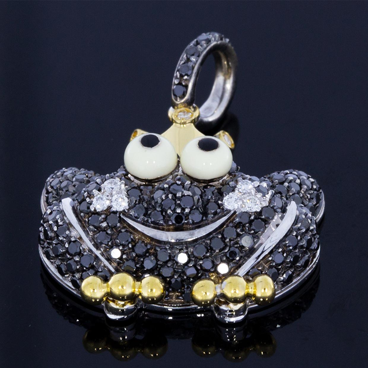 This limited edition Aaron Basha frog prince is definitely kissable! He is crafted in delectable 18kt yellow gold and adorned with scintillating black diamonds. Two swatches of stunning white diamonds form the cheeks of his bashful face while his
