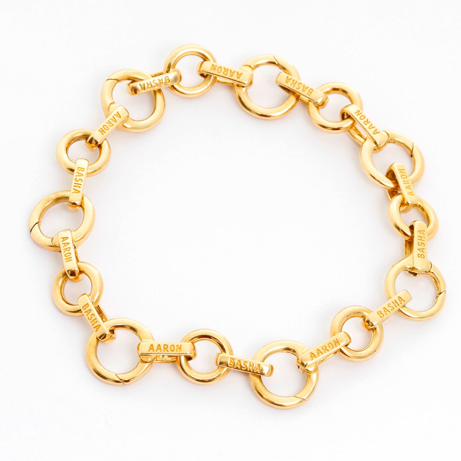 18K Yellow Gold Bracelet with small open links ( 7 ) for charms. Wrist size 6 3/4 inches. Total weight 24.4 grams. Hallmarked on each link Aaron Basha.