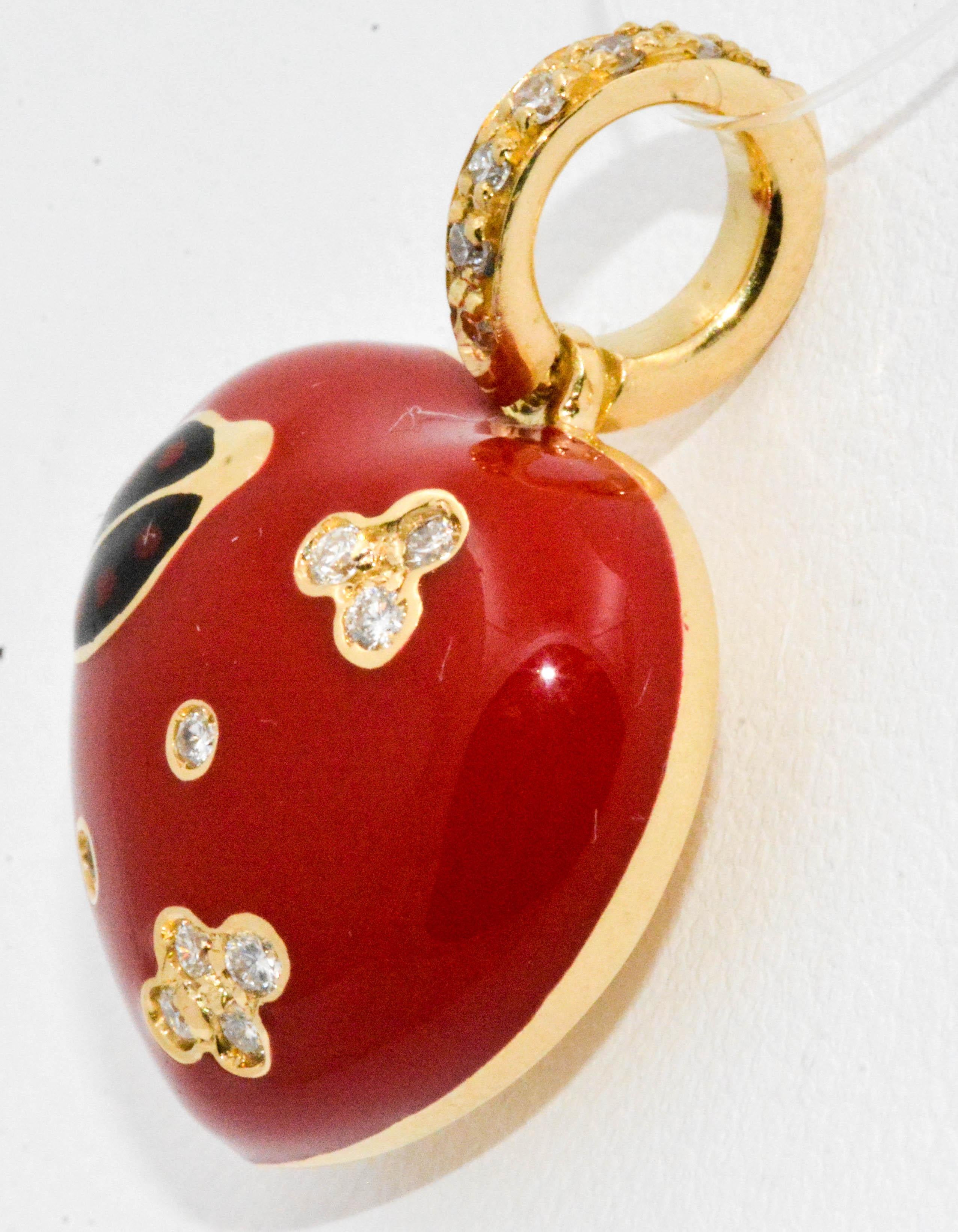 Hearts delight! This delightful Aaron Basha red enamel heart charm has diamonds and a ladybug motif. 14 round brilliant cut diamonds ( .14 ctw G color, VS internal clarity) are pleasantly set on a graceful 14 karat yellow gold bail and randomly