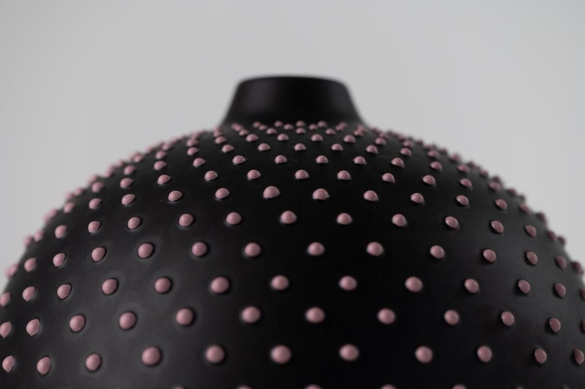 This pattern is part of Nuoveforme's and Ceramiche Bagni history. It is an extremely complex work that features the manual application of each single “dot” that is achieved with the use of a special tool, after having drawn the design directly on