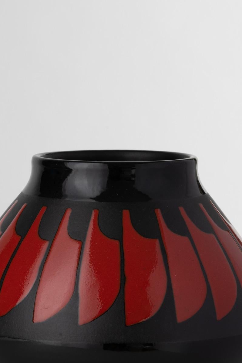 This vase is one of the most stunning evidences of our know-how and it is the result of a years long experience and technical skills.
Its making features 3 different firings and passages with latex resists in order to create the design and the