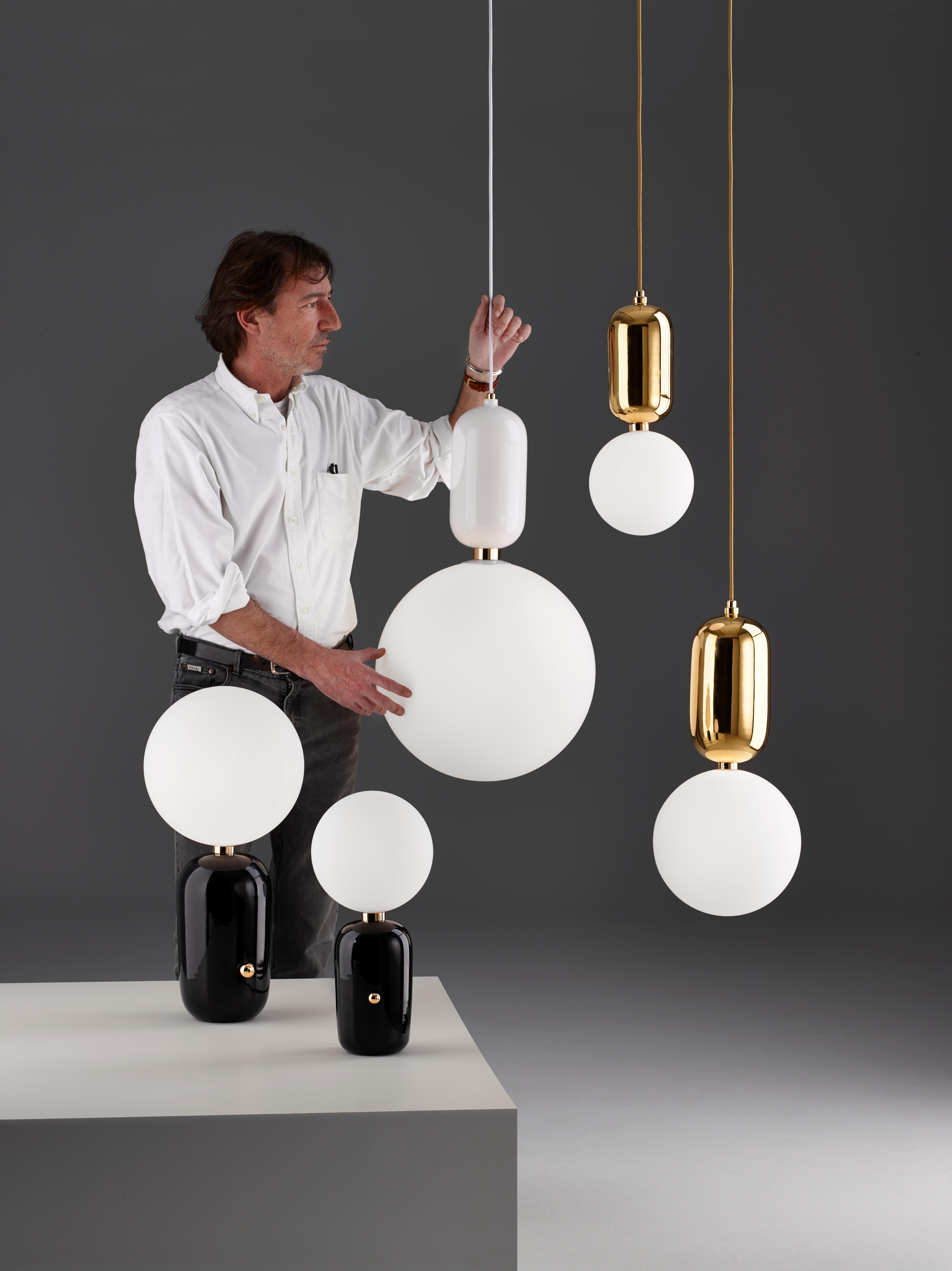 ABALLS A II ME


Wall lamp. Base in white, black, golden, copper or platinum ceramic. Diffuser in blown opal matt glass. By Jaime Hayon, 2016
Manufactured by Parachilna.


Shiny and eye-catching collection. Matching two nobel materials: ceramic and