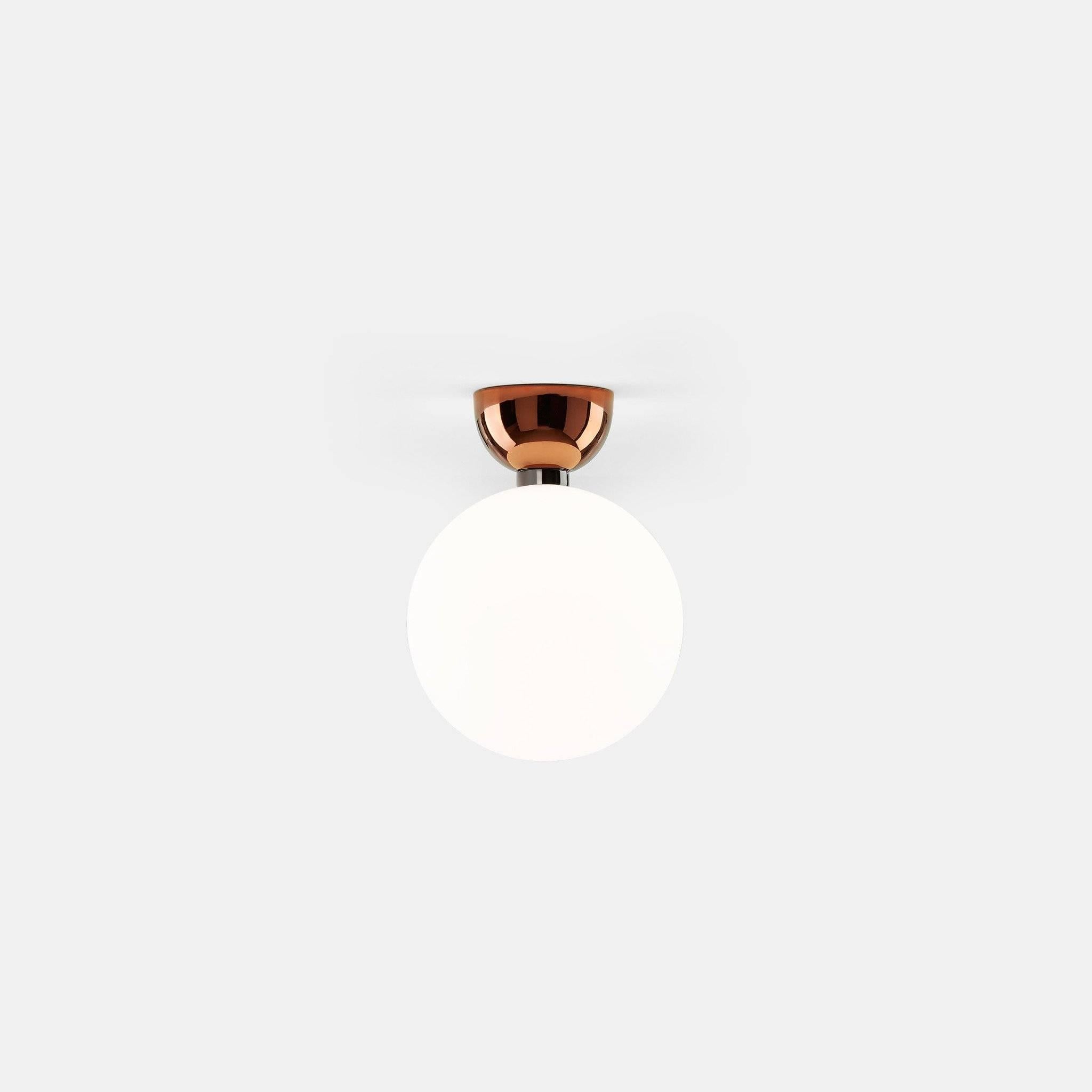 Wall / Ceiling lamp with a painted ceramic base in black, white, copper, golden or platinum finish and a diffuser in blown opal matte glass. 

Designed by Jaime Hayon.

Material:
Structure: Ceramic
Diffuser: Glass

Voltage: 230V
Light