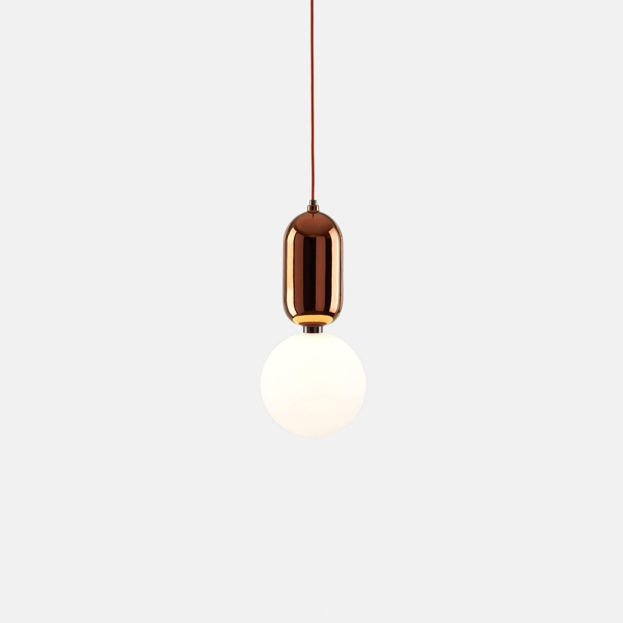 Suspension lamp with a painted ceramic base in gold, platinum or copper finish and a diffuser in blown opal matte glass. 

Available in the following finishes: 
White, black, platinum, gold or copper

Designed by Jaime