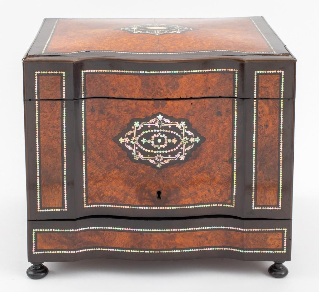 European, likely French, Abalone Inlaid Burlwood Tantalus Chest, the lid opening to reveal a gilt bronze stand with four bottle inserts, all upon four squat feet, circa nineteenth century. 11