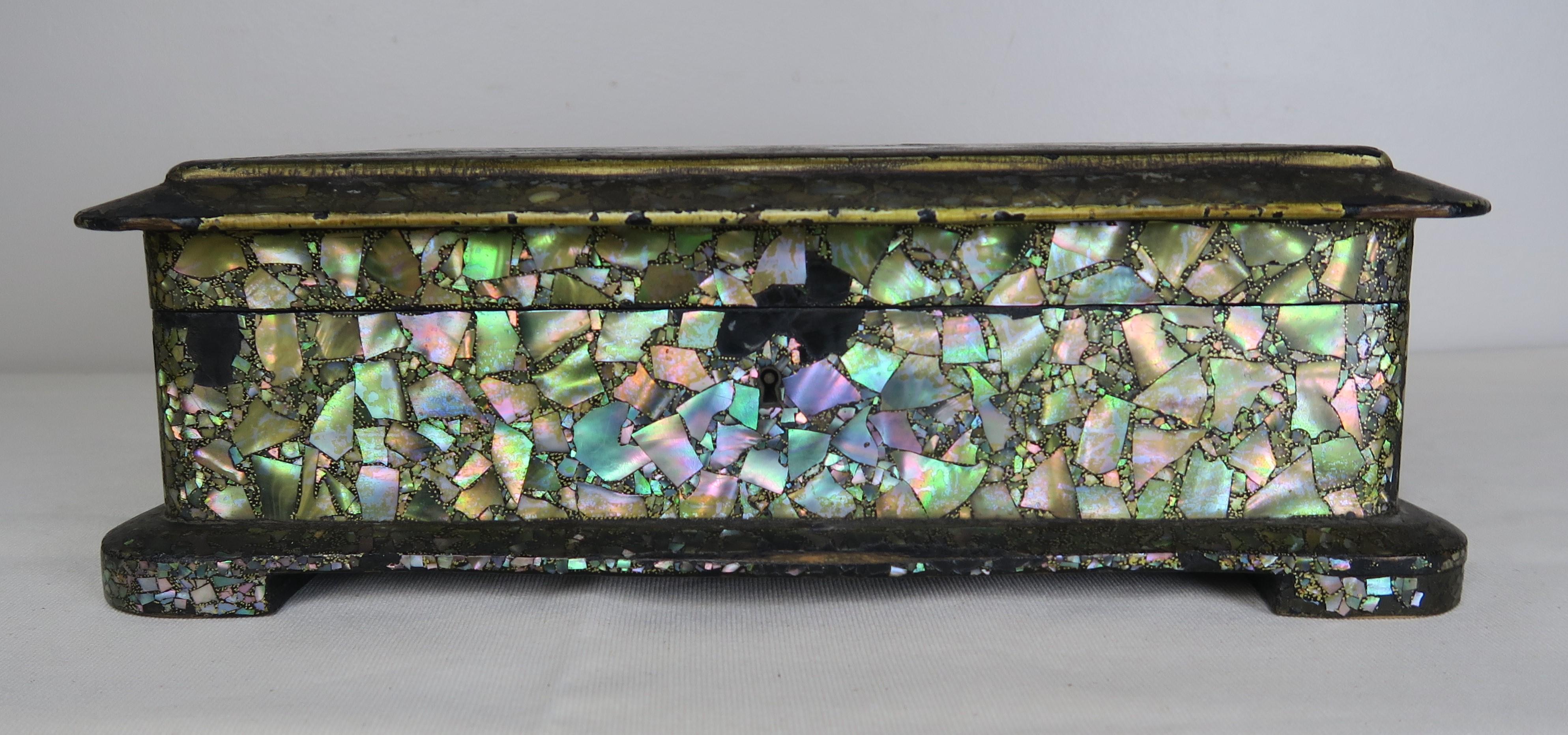 English paper mache and mother of pearl jewelry box depicting a charming scene with three generations of women enjoying their time together. Silk lining.