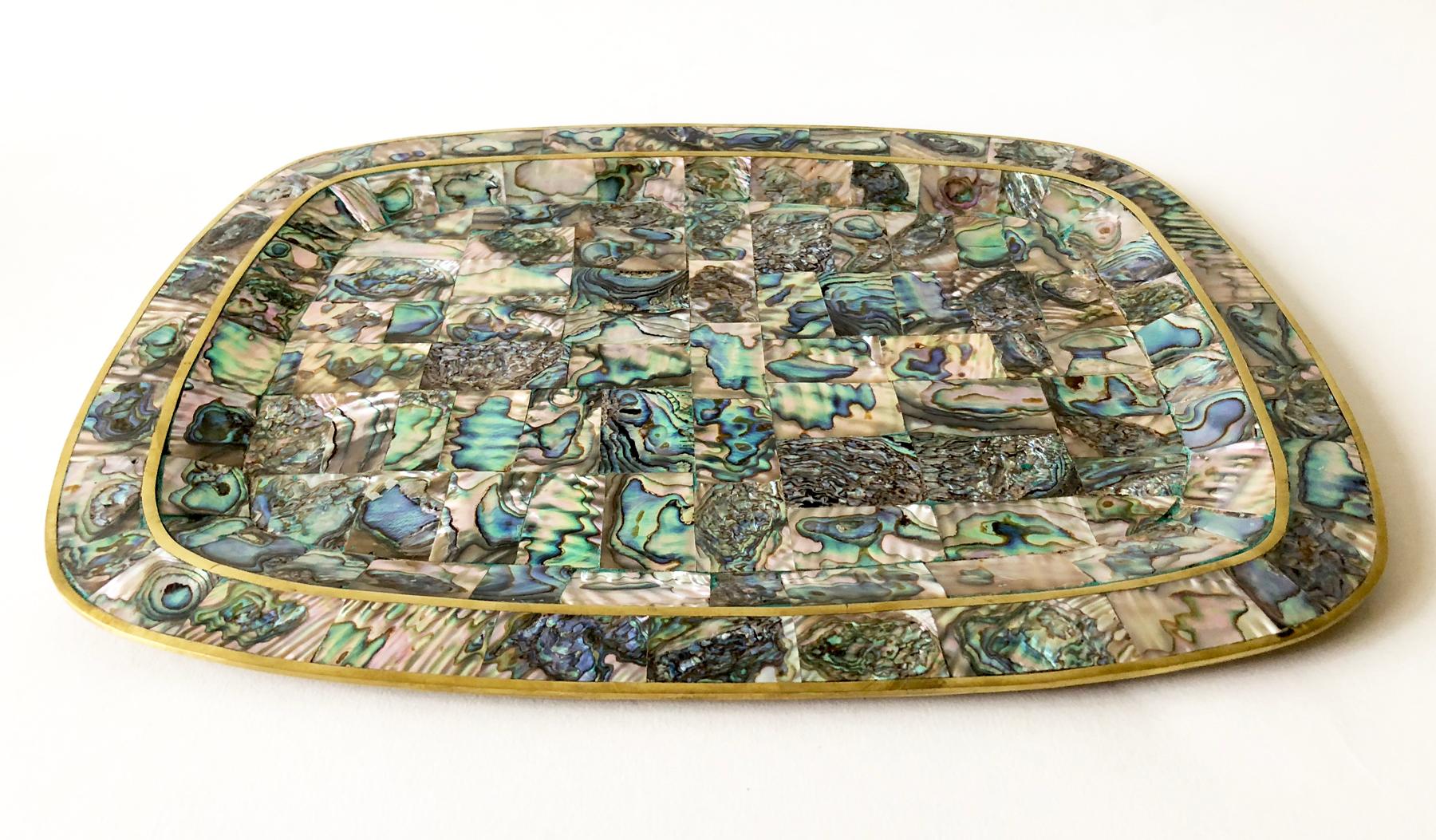 Inlaid abalone and brass tray, circa 1950s - 1960s. Tray measures 10.25