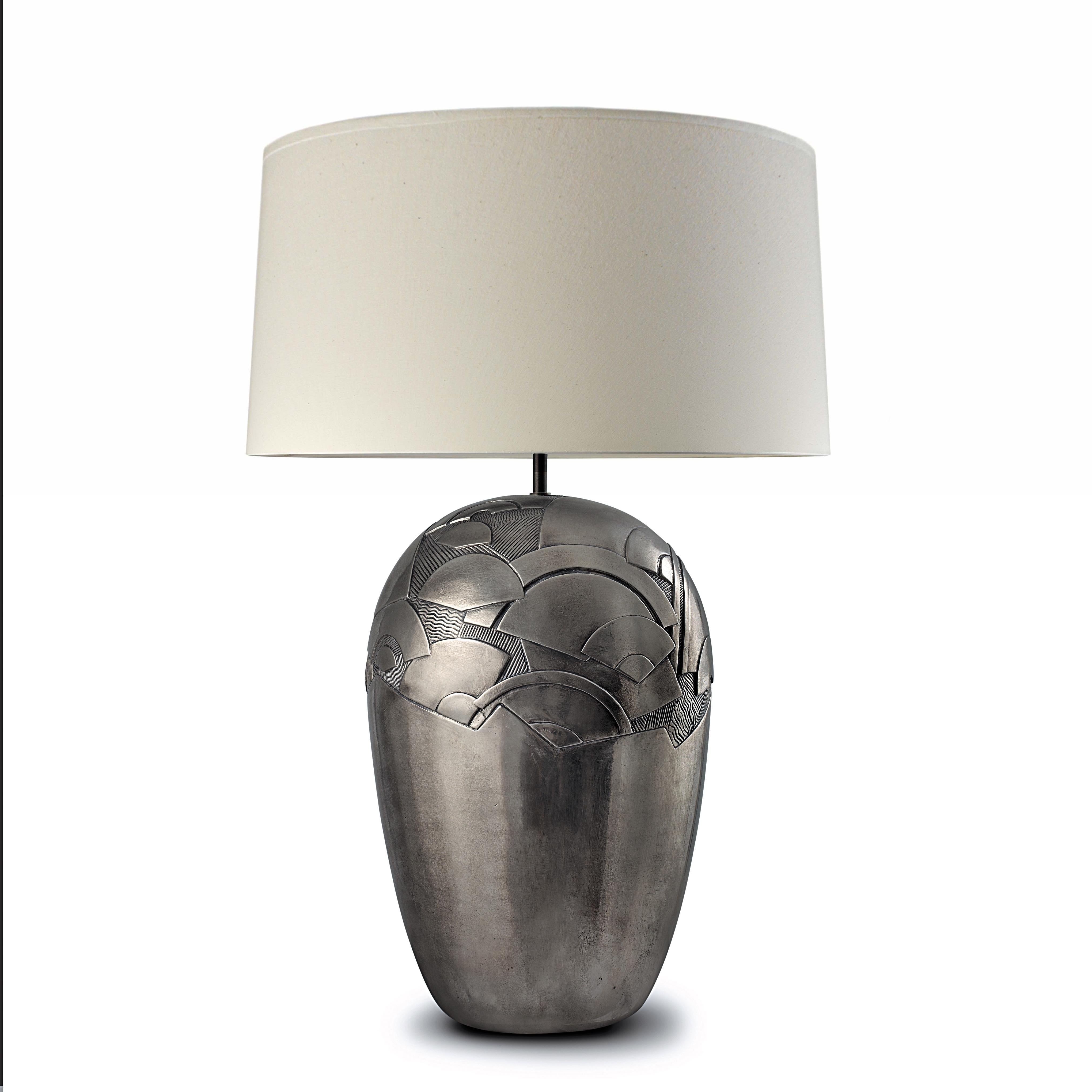 Contemporary Art Deco design handmade and hand-finished table lamp. We combine skilled craftsmanship with the finest materials to give shape to our designs. Its artisan finish makes each piece different from the other and easy to customize. Each