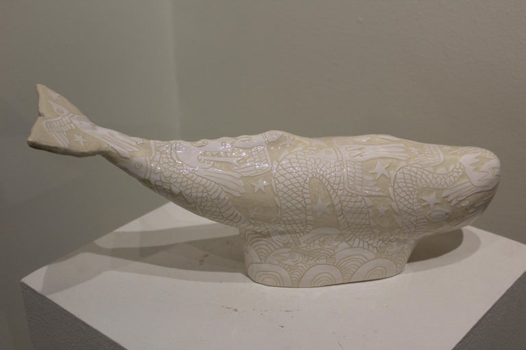 Sgrafitto design, hand-carved, porcelain whale. Hand made ceramic sculpture by Abbey Kuhe. 