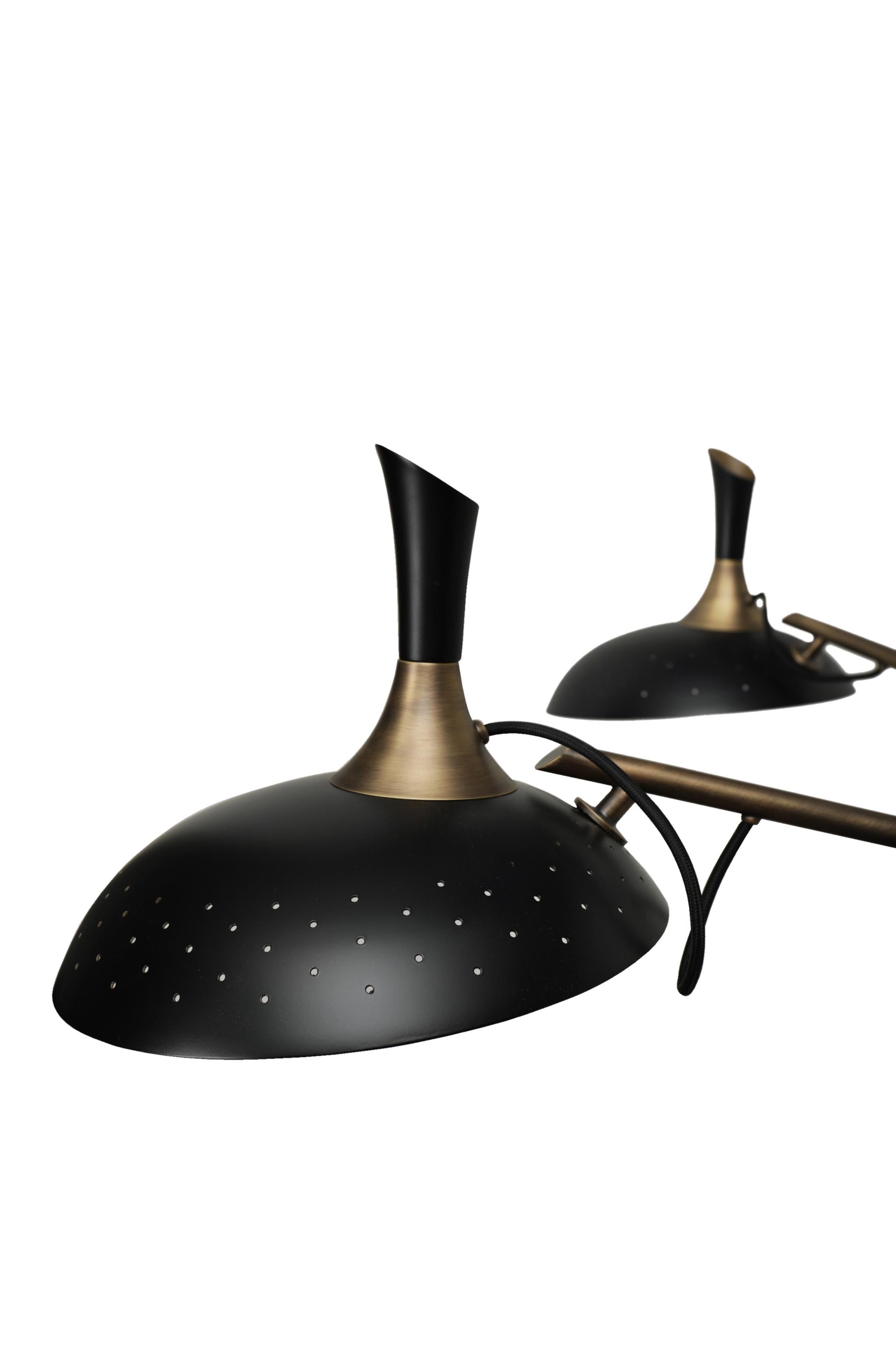 Inspired by the enigmatic life of Abbey Lincoln, this majestic pendant light will be the right lighting design choice for a dramatic dining room. A memorable piece that counts with golden finishes and black matte to give it a twist. This luxurious