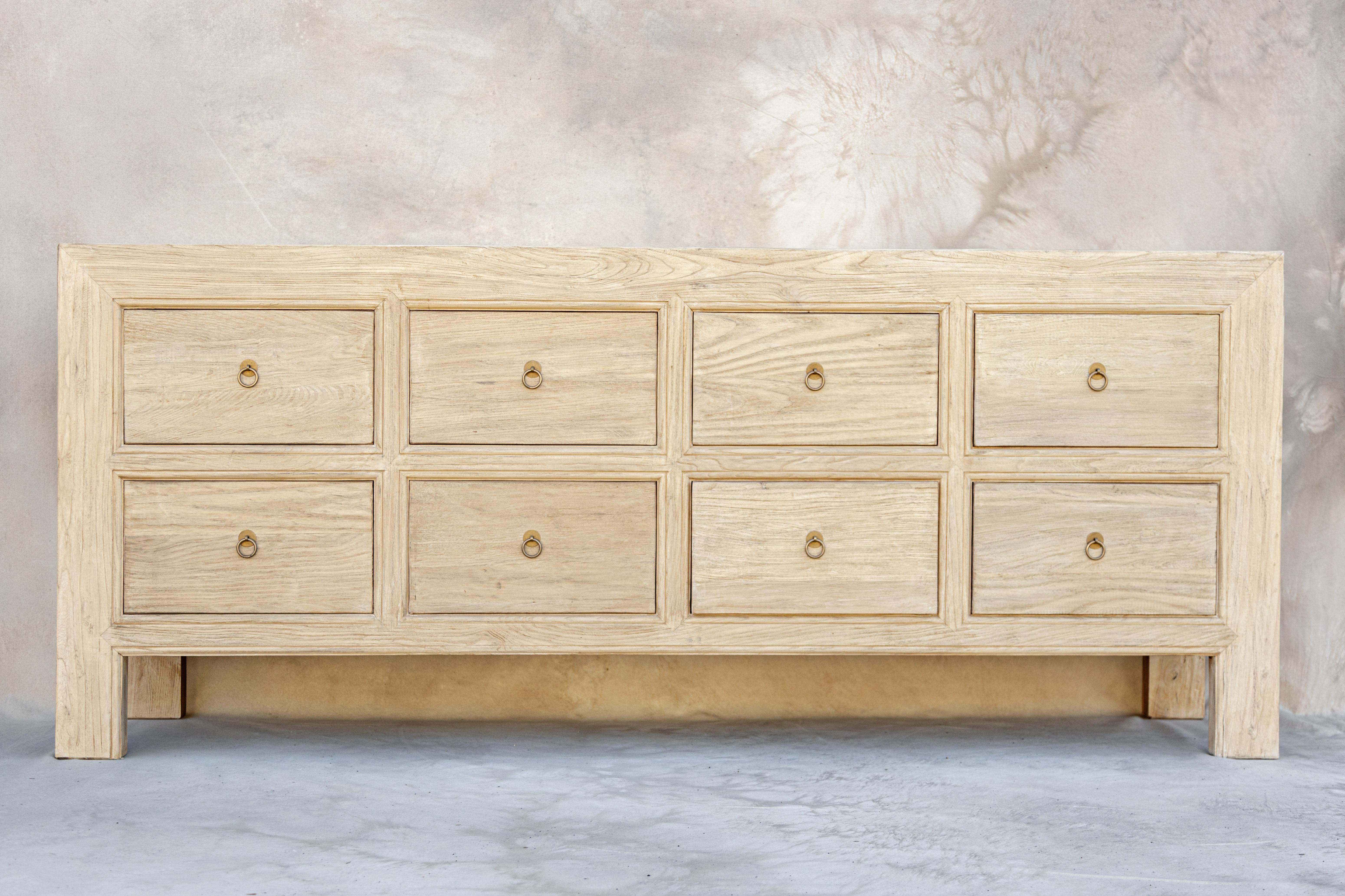 Introducing our Abbott 8 drawer dresser. Crafted from vintage elm wood sourced throughout Europe and Asia. We love the natural wood tone and beautiful textures of this piece. Use as a dresser or even a sideboard. Each piece is one of a kind. No two