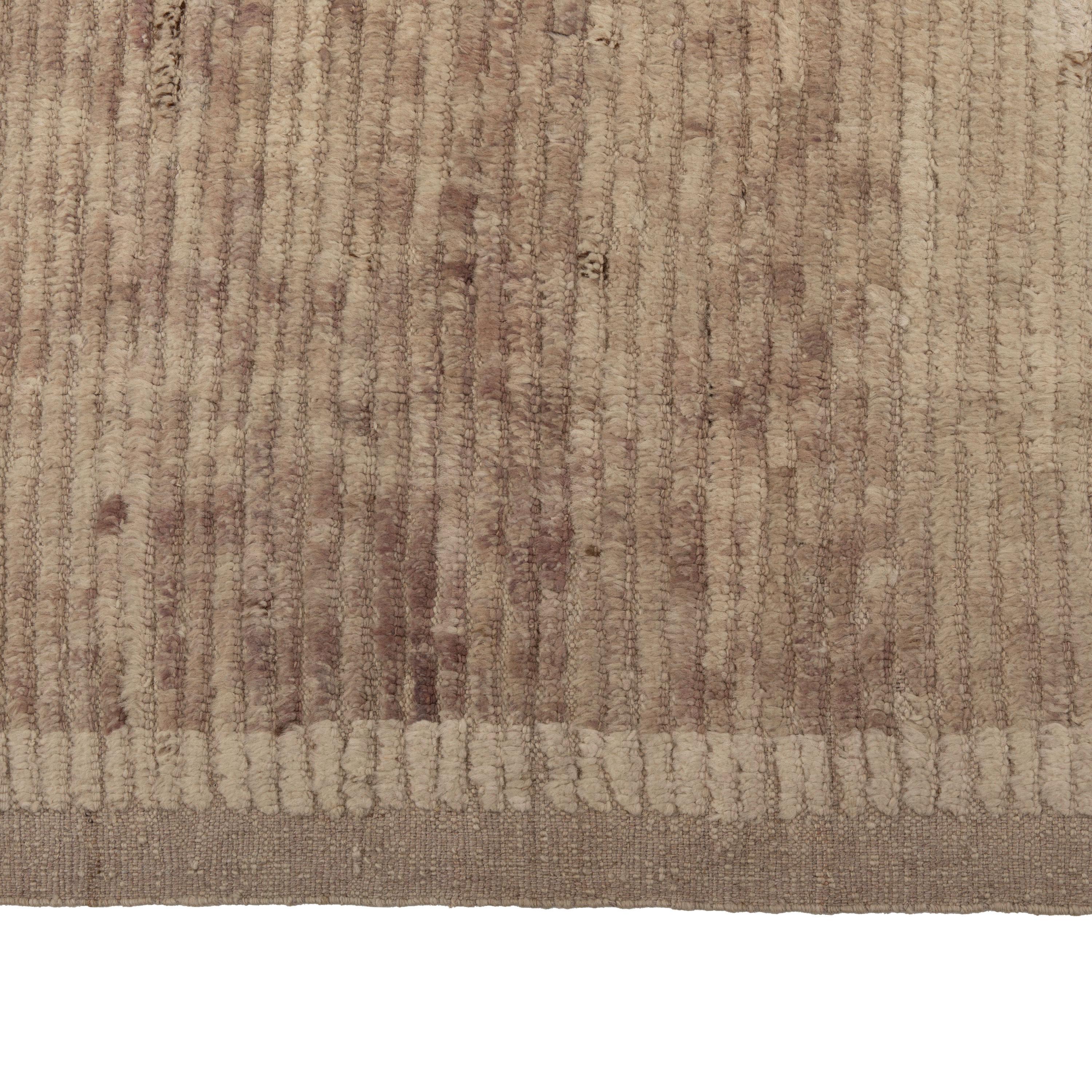Inspired by the grounding foundations of Earth's natural colors and pure materials, this Zameen Beige Geometric Modern Wool Rug - 10'4