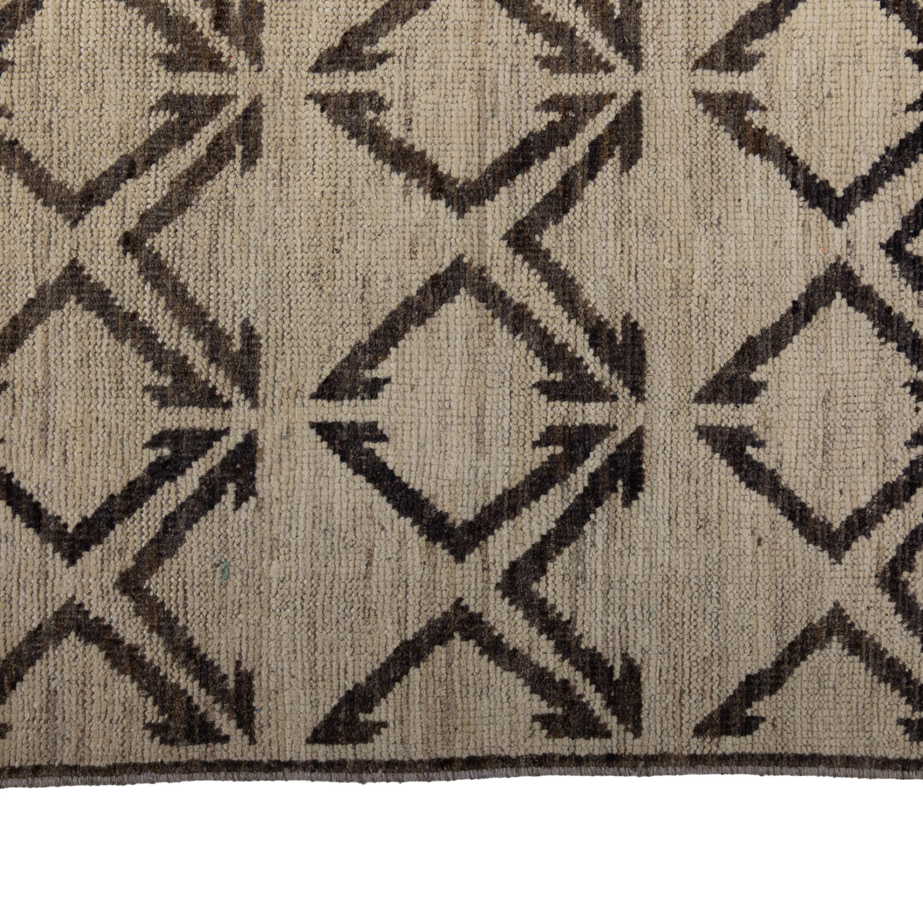 Inspired by the grounding foundations of Earth's natural colors and pure materials, the Zameen Collection features a wide array of Mid-century modern motifs in soft neutral tones. Hand-knotted in Central Asia, Zameen rugs will be celebrated for