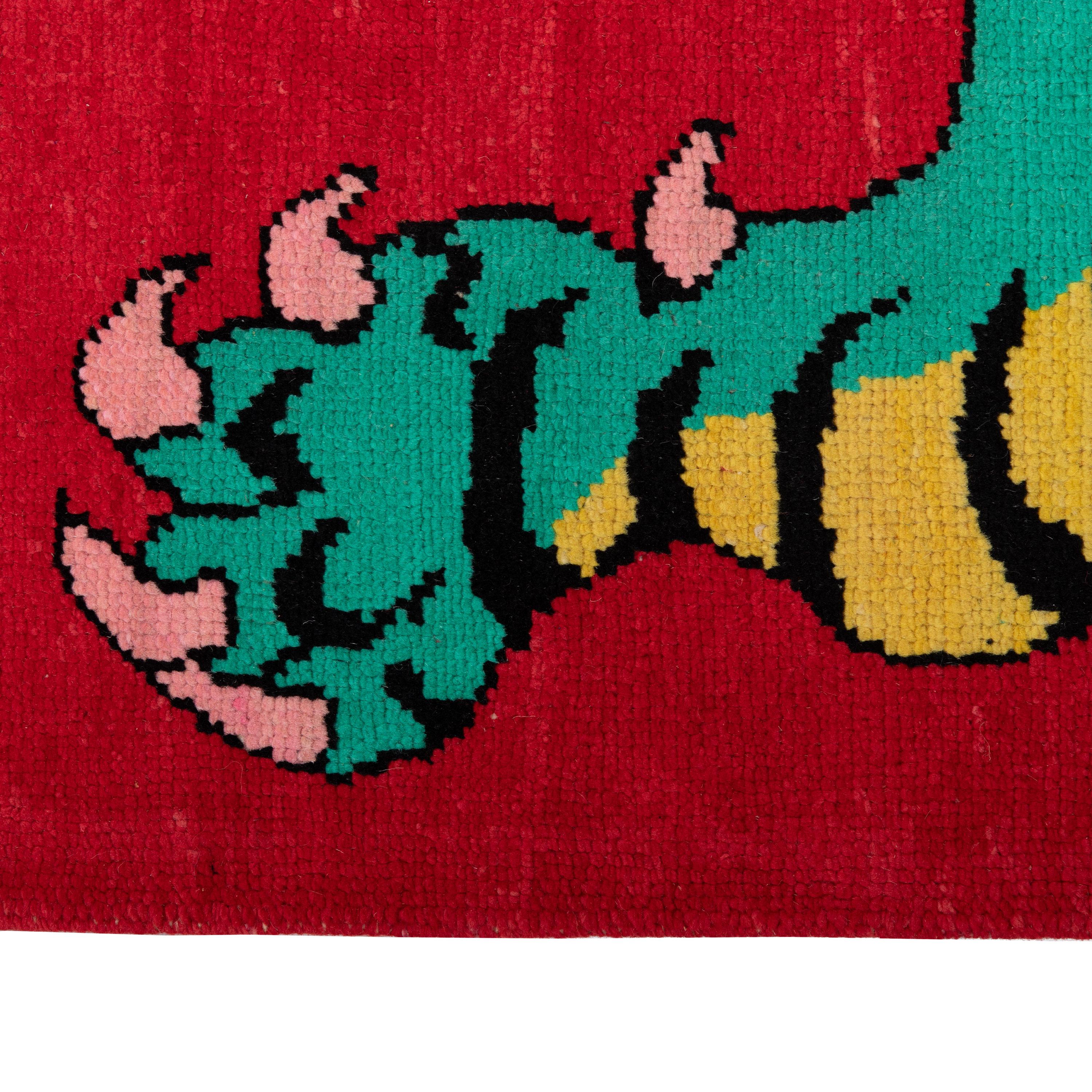 Ce tapis en laine tigre contemporain rouge - 5'8