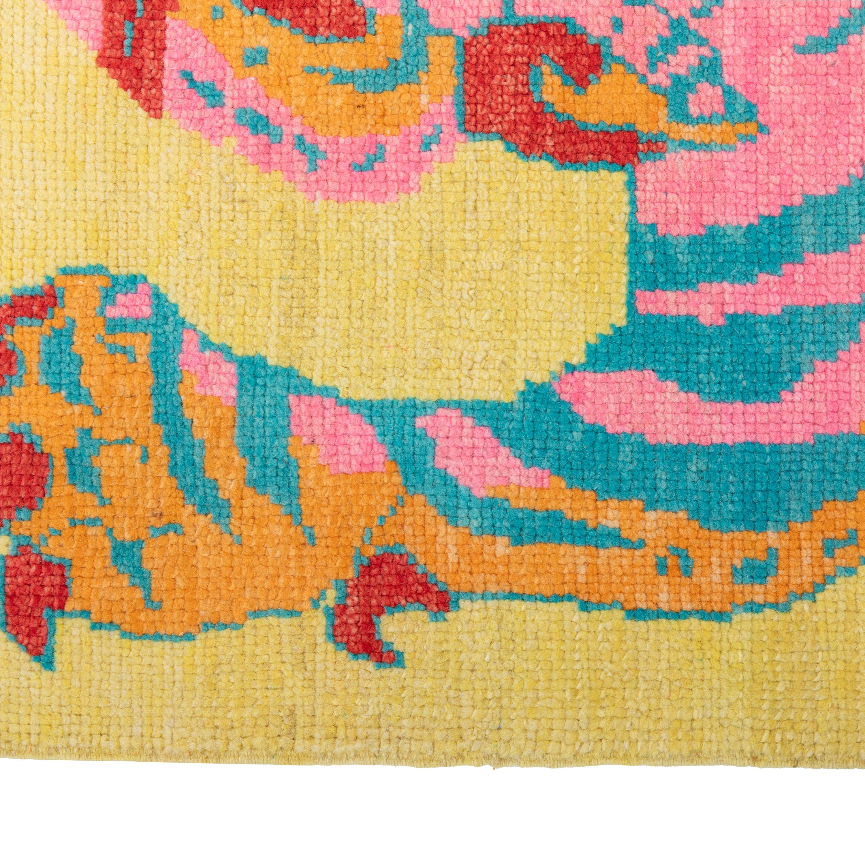 This Yellow Contemporary Tiger Wool Rug is a vibrant piece featuring a stylized tiger design on a yellow background. Hand knotted in Turkey, this 4'1