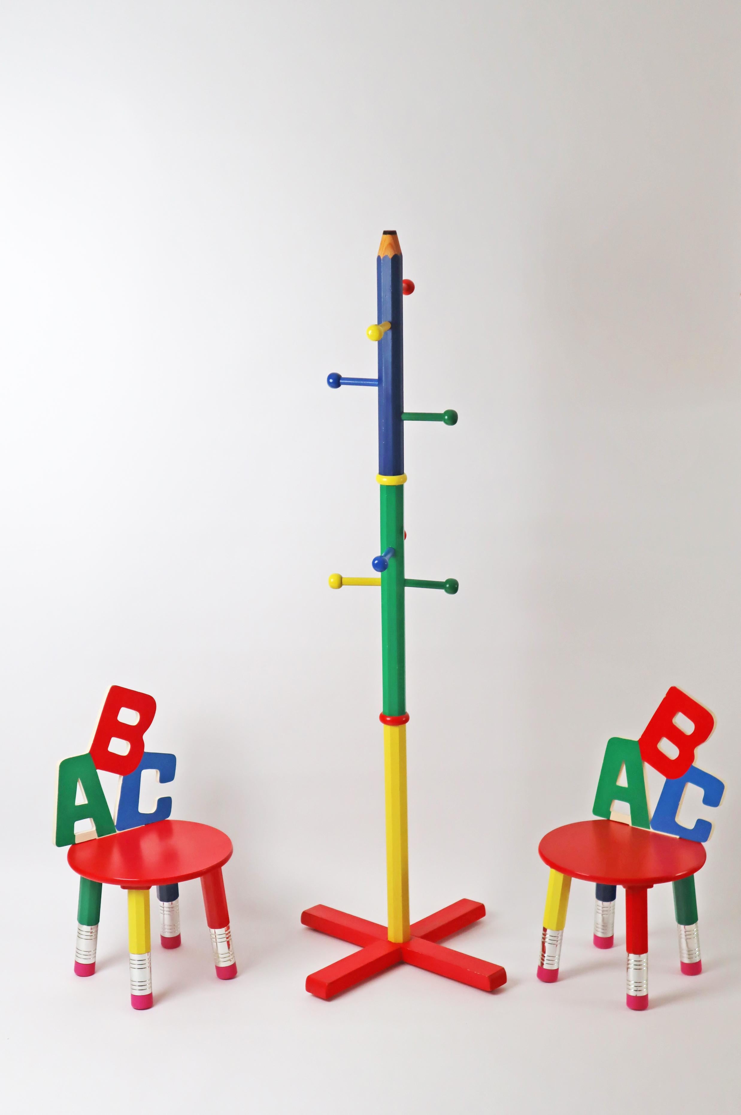 Exceptional and rare set of two ABC children's chairs and a clothes rack with a height of 125 cm by the designer Pierre Sala. The design of this children's set is unique and exceptional, the high-quality and stable workmanship is perfect, emphasis