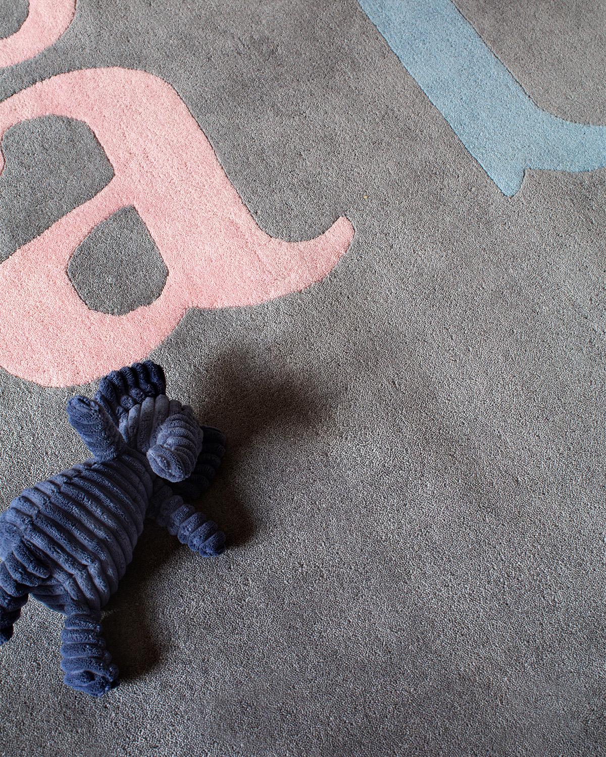 Swedish. It’s a funny language, so why not learn it young! This is åbc. Our first kid friendly rug that puts learning at your kids feet. The Minimalist design is meant to inspire curiosity for languages for both children and adults. The rug is woven