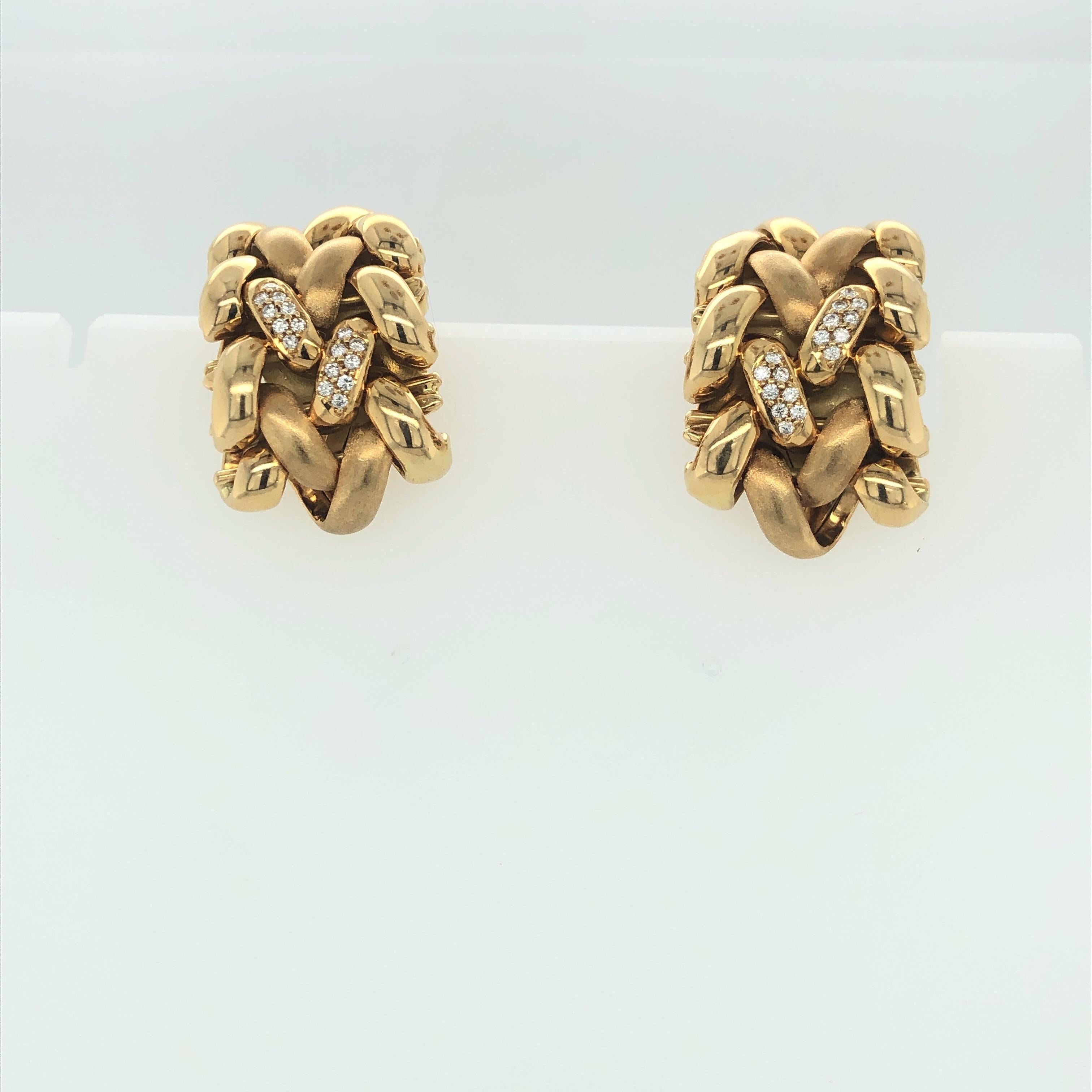 One pair of Designer Earrings by Abel and Zimmerman in 18K Yellow Gold.  Abel and Zimmerman are well known in Germany.  This beautiful pair of Clip On Earrings are woven link Hoop Style.  Nice, rich superb craftsmanship.  Four links feature 8