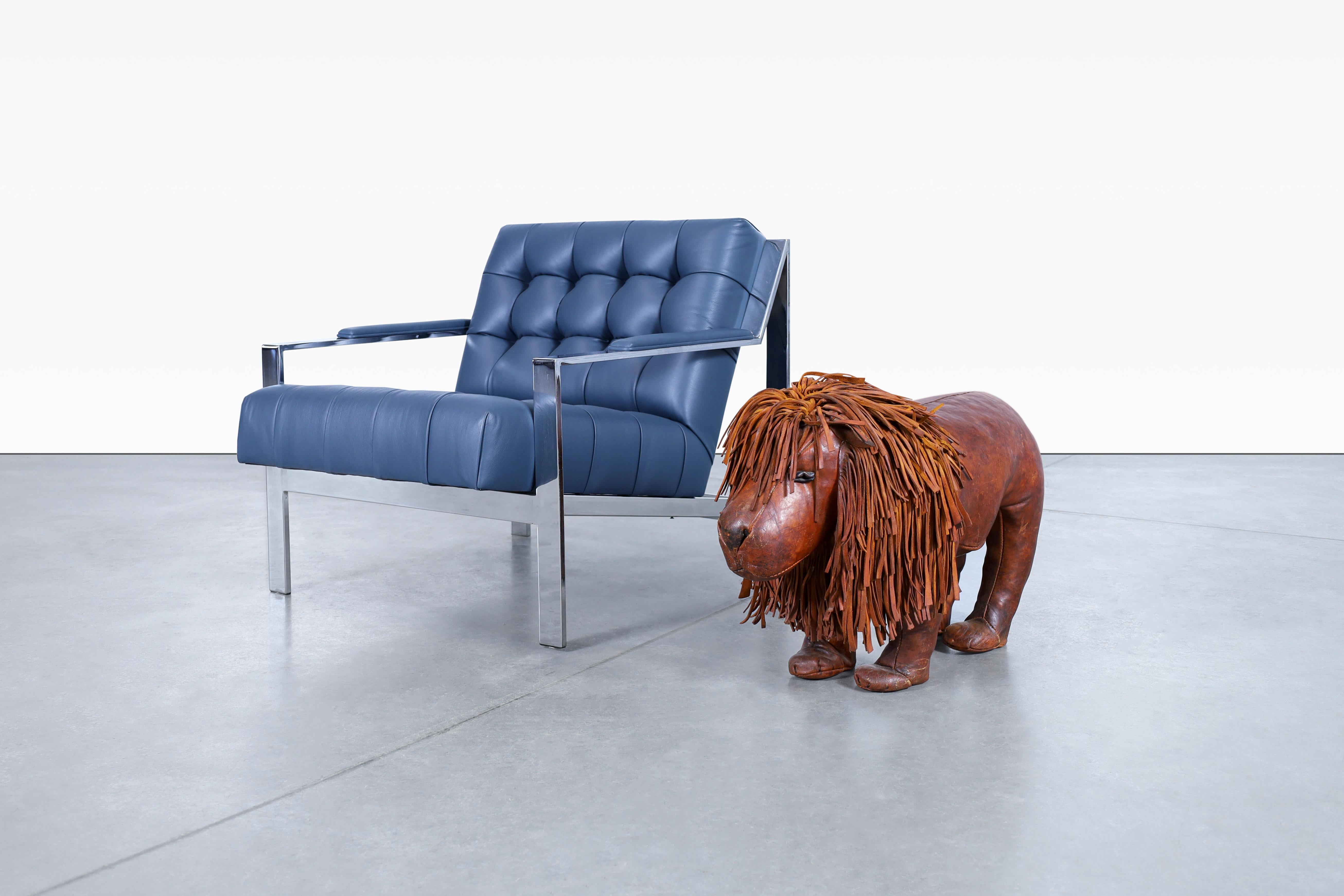 Adorable vintage leather lion footstool by Dimitri Omersa, manufactured in England, circa 1960s. Meticulously manufactured by Abercrombie and Fitch, this footstool showcases the high-quality craftsmanship and exquisite design. Originally designed to
