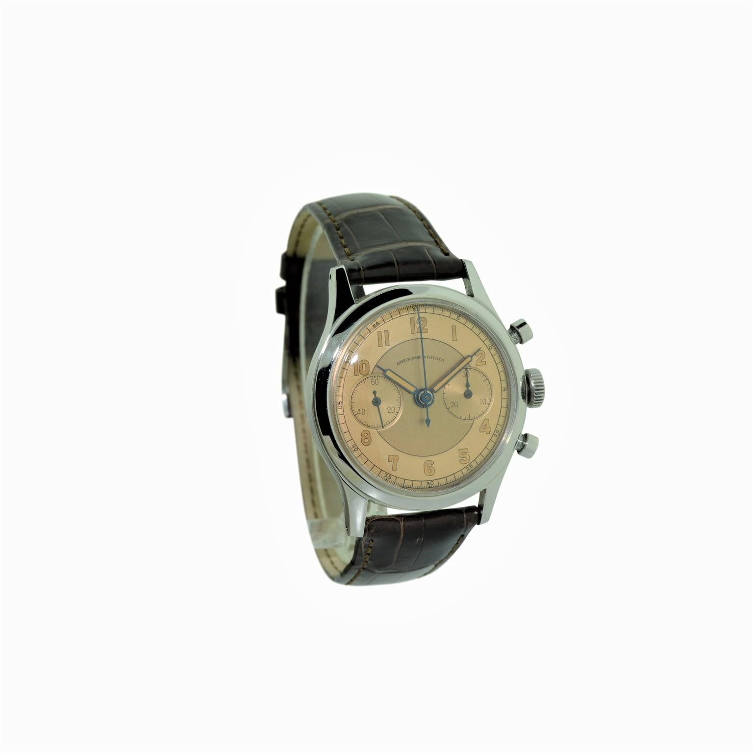 FACTORY / HOUSE: Abercrombie & Fitch 
STYLE / REFERENCE: Art Deco / Waterproof Style
METAL / MATERIAL: Stainless Steel 
DIMENSIONS:  46mm  X  38mm
CIRCA: 1940's
MOVEMENT / CALIBER: Manual Winding / 17 Jewels / Venus 14 L
DIAL / HANDS: Arabic