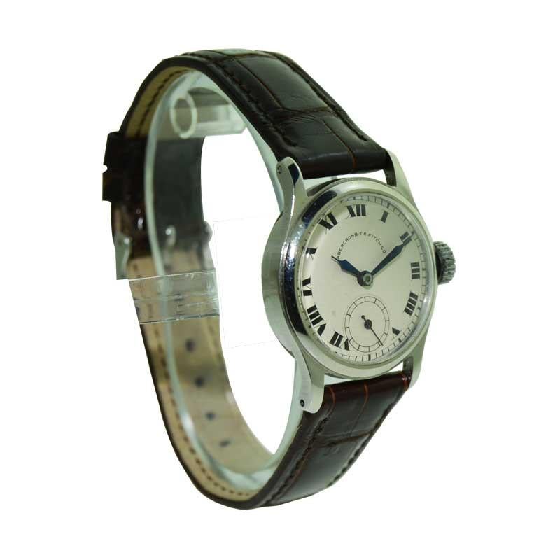 FACTORY / HOUSE: Abercrombie & Fitch Co
STYLE / REFERENCE:
METAL / MATERIAL:  Stainless Steel
CIRCA / YEAR: 1920
DIMENSIONS / SIZE: 37 mm X 29 mm
MOVEMENT / CALIBER: Manual Winding / 15 Jewels 
DIAL / HANDS:
ATTACHMENT / LENGTH:  Alligator, 20mm /