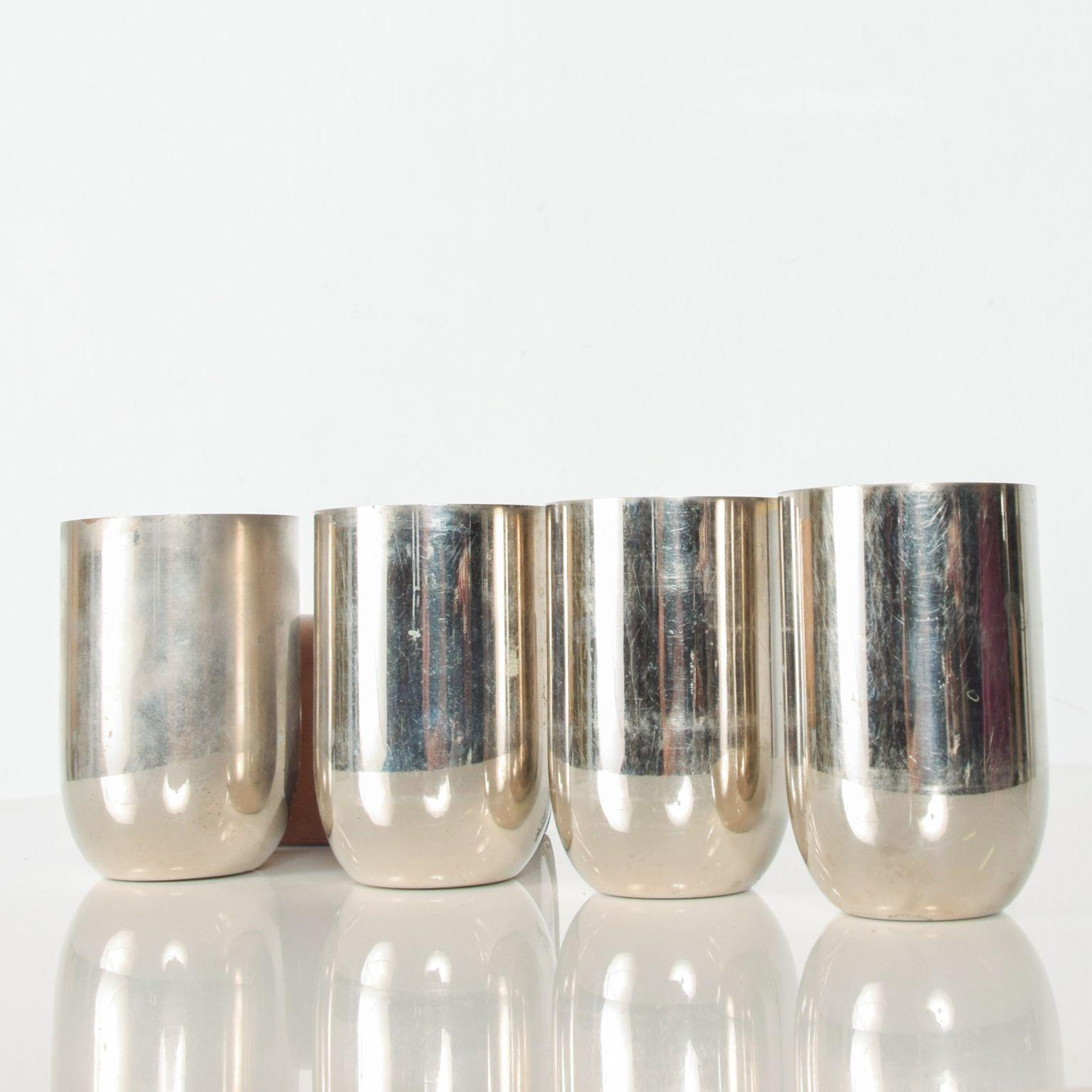 For your pleasure:  Set of Four Abercrombie Traveling Small Silver Cups in Leather Case, 1960s

Made in England, circa the 1960s. Leather case is stamped with initials. 

Patina present. Vintage wear. See images. Unrestored Condition.

Dimensions: 3