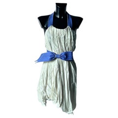 Abito Couture Nina Ricci in seta avorio con cintura a fiocco a contrasto, collez