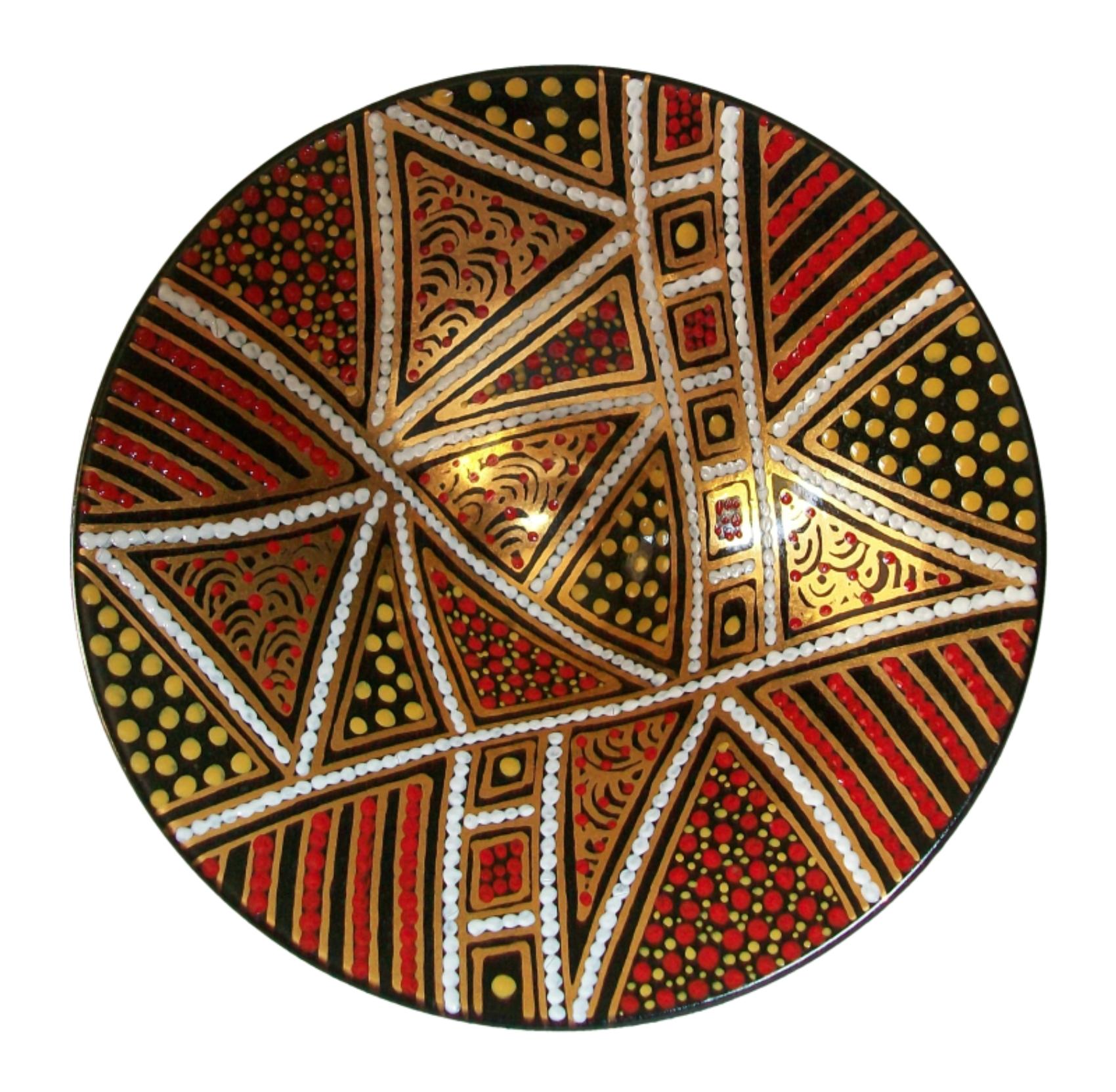 Aboriginal 'dot' pattern studio pottery bowl with gilded highlights - wheel thrown conical shape - hand painted design with mirror black glaze to the outer sides and background - signed (unknown/unidentified artist/potter) - Australia - late 20th