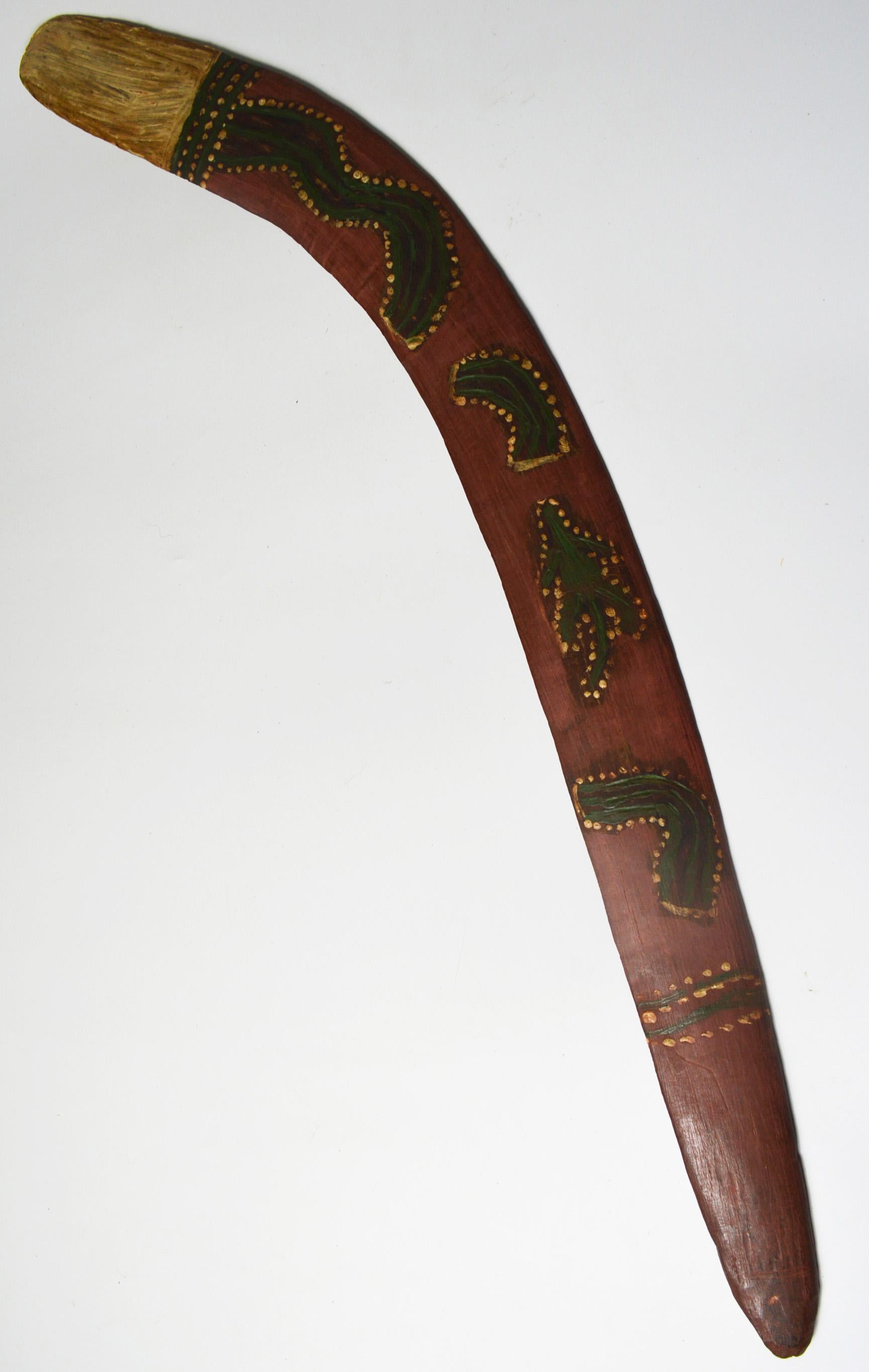 A Fine Australian Aboriginal painted ceremonial Boomerang
Decorated with paint and natural pigments
Central desert region Australia
Period: early 20th century
Provenance: Old UK Collection
Measures: Length: 76 cm, width 6 cm.