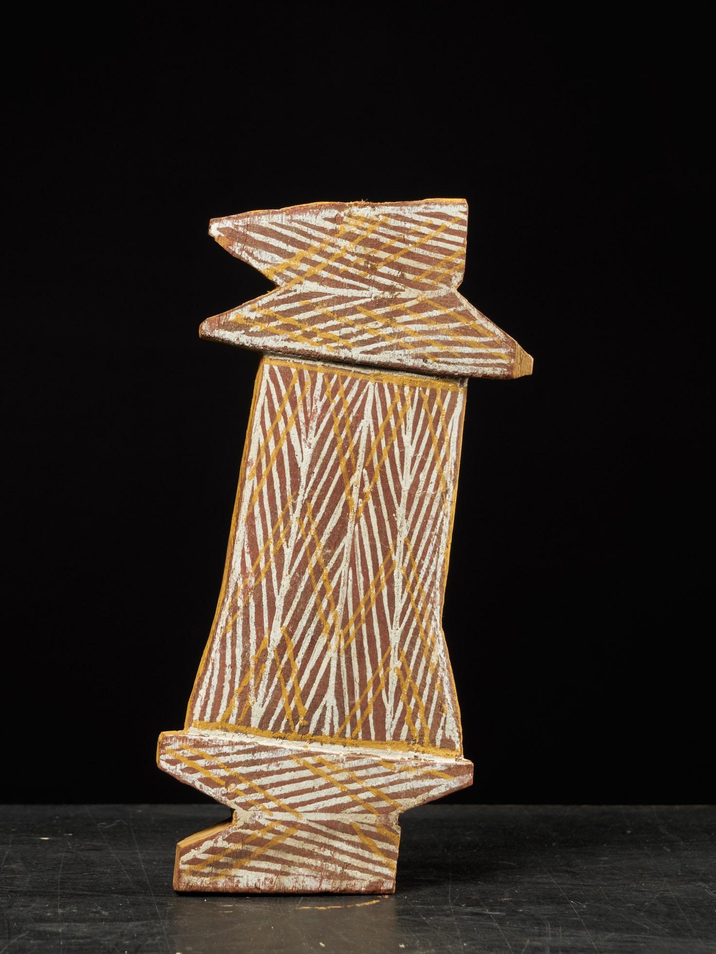 Aboriginal People, Australia, Tiwi painted ritual object and clapper sticks.