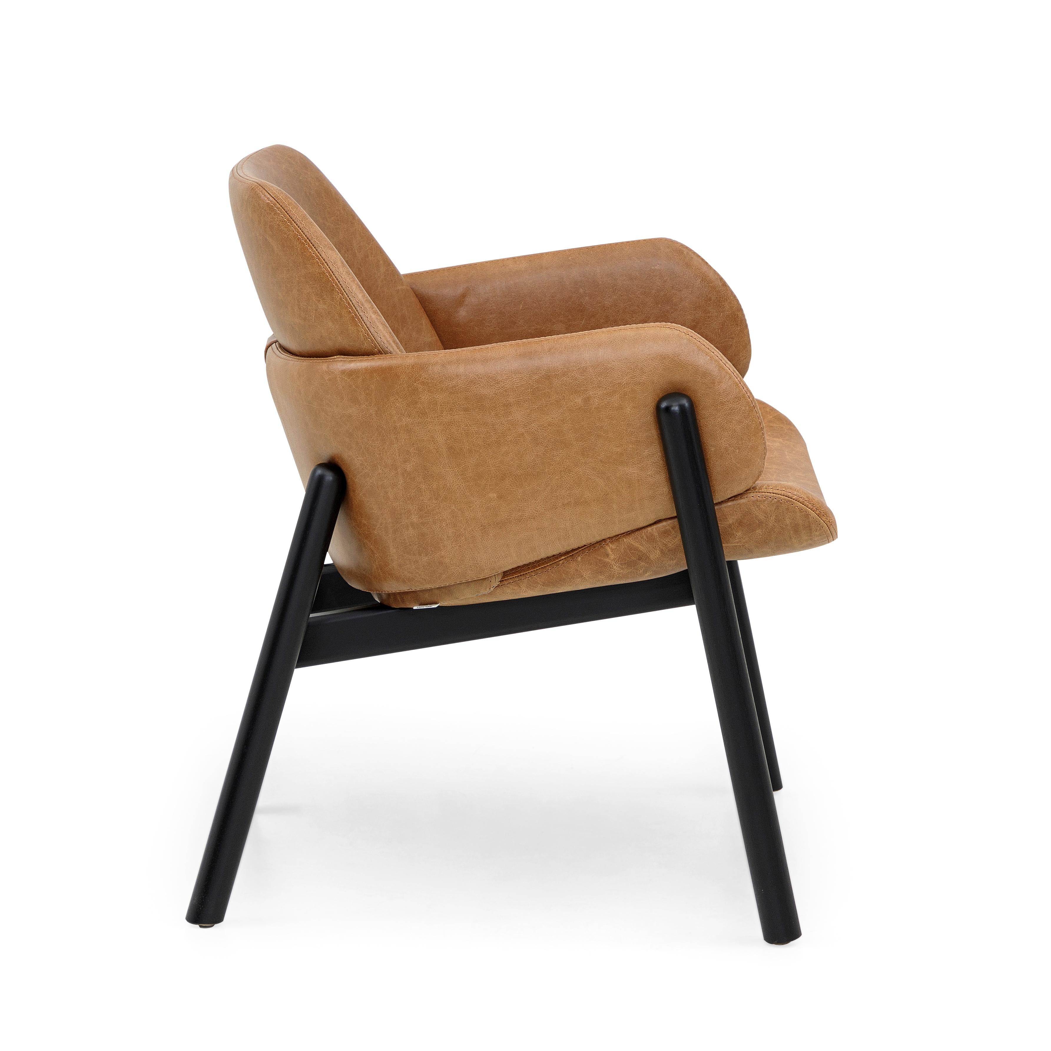 The above chair goes above and beyond in terms of design and comfortability. The combination of the brown leather and the black painted frame allows you to mix the Above chair in rooms already established and rooms of the new design. The seat, back,