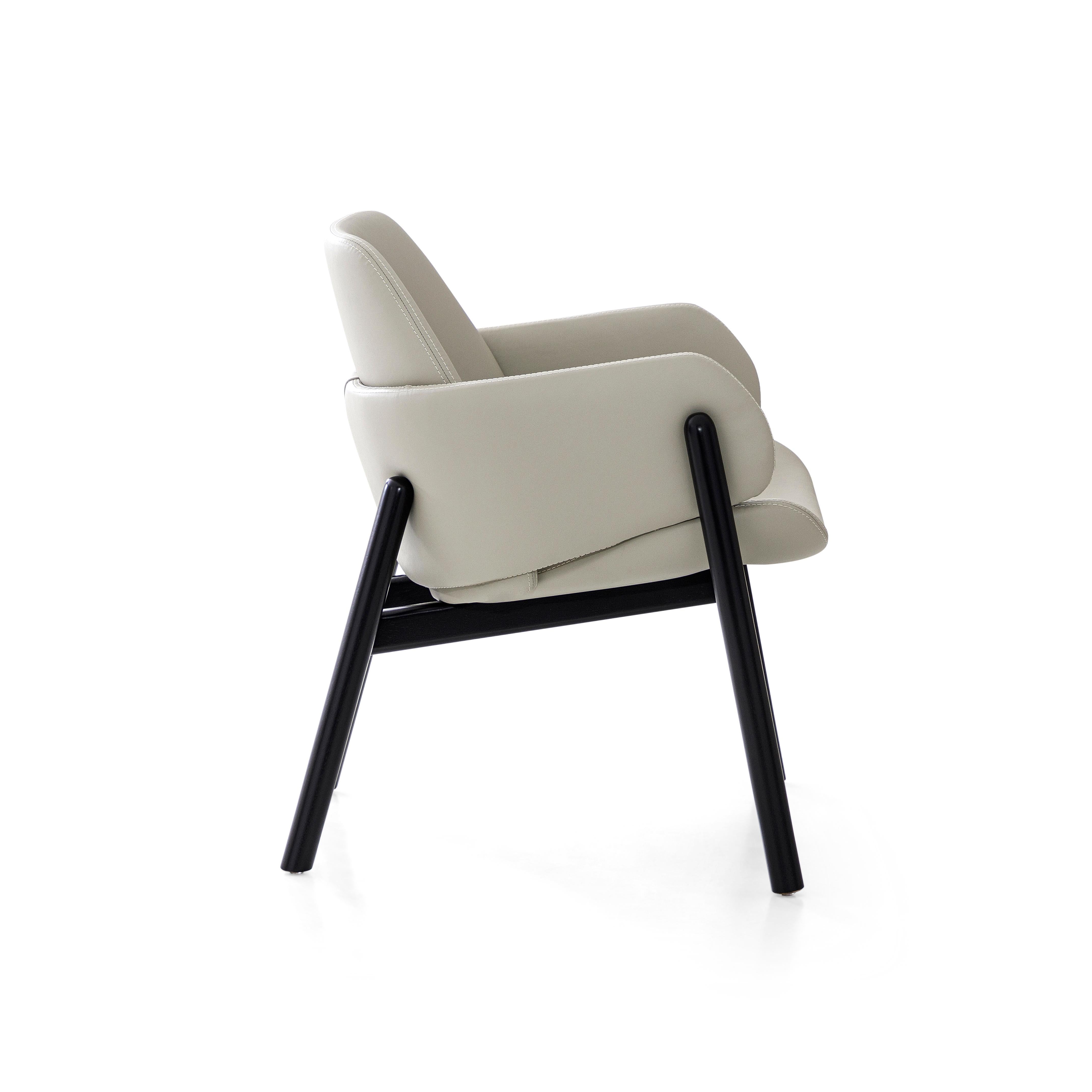 The above chair goes above and beyond in terms of design and comfortability. The combination of the off-white leather and the black painted frame allows you to mix the Above chair in rooms already established and rooms with a new design. The seat,