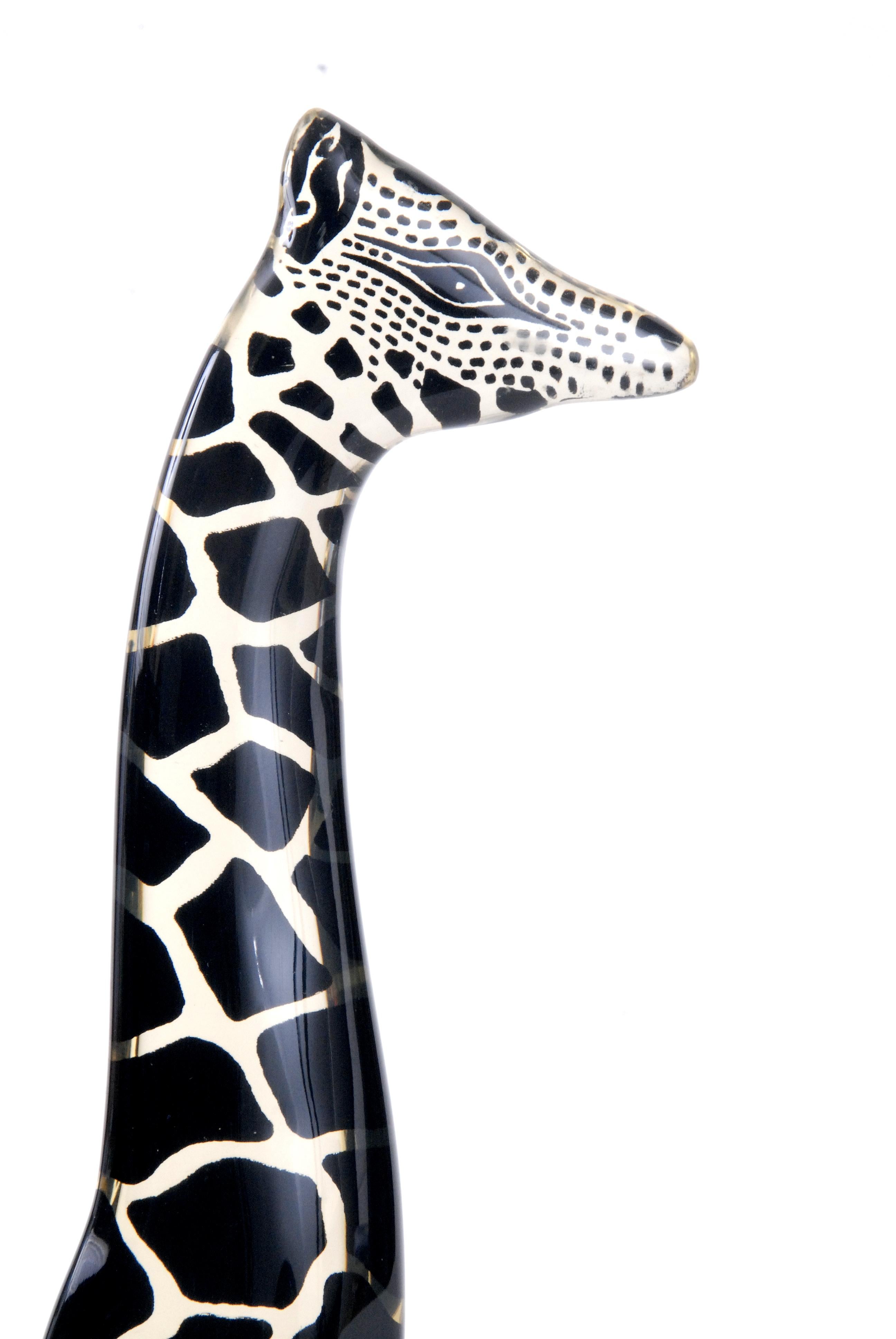 A large black giraffe in perfect condition with its label still attached, last photo shows comparison between the 2 giraffes listed for sale.
This one is 31.5 cm in height.