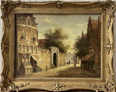 A Dutch Town Scene signed early 20th Century oil on canvas