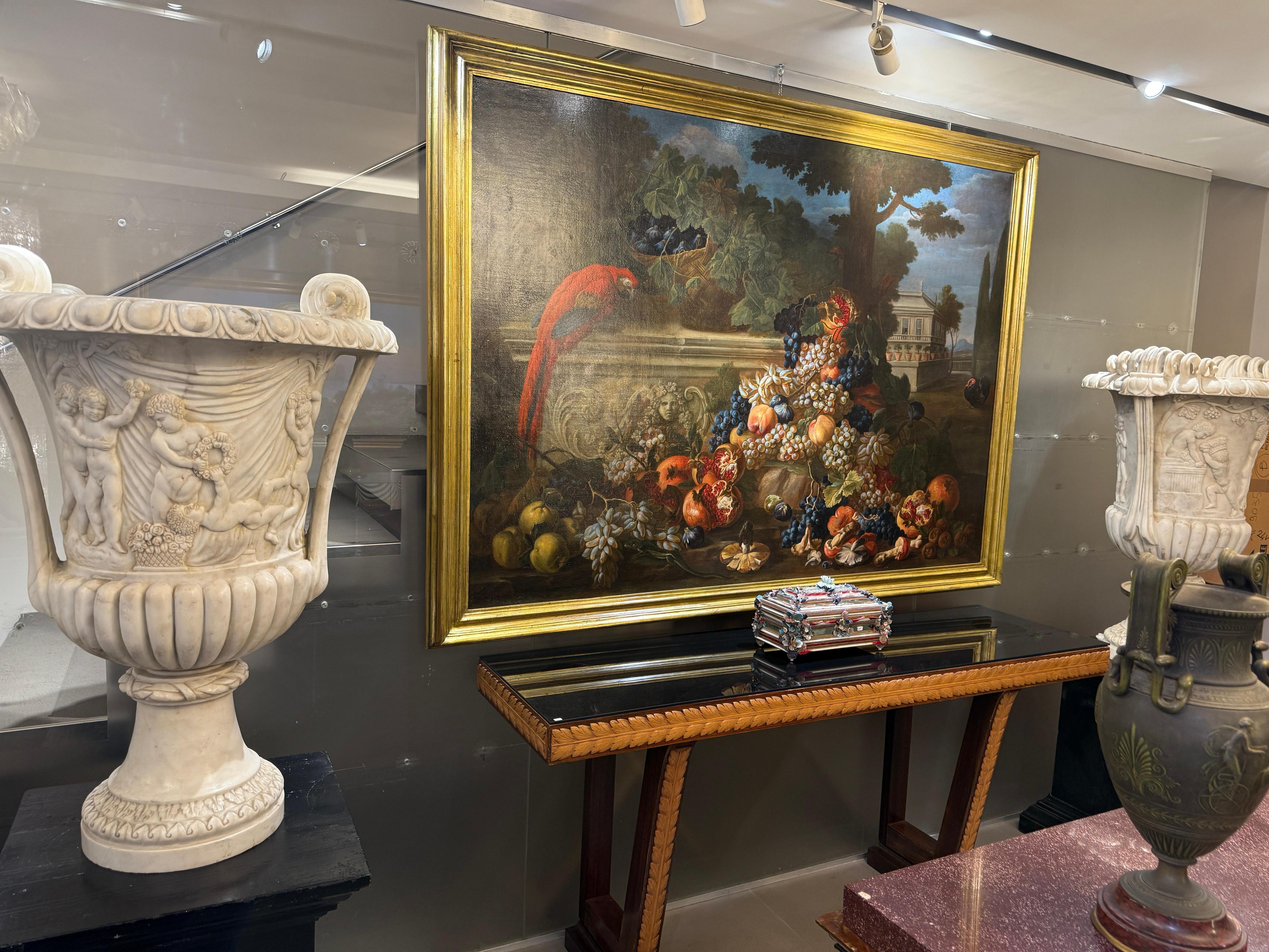 Exceptionnelle nature morte italienne du 17e siècle avec un perroquet rouge et des fruits - Marron Still-Life Painting par Abraham Brueghel