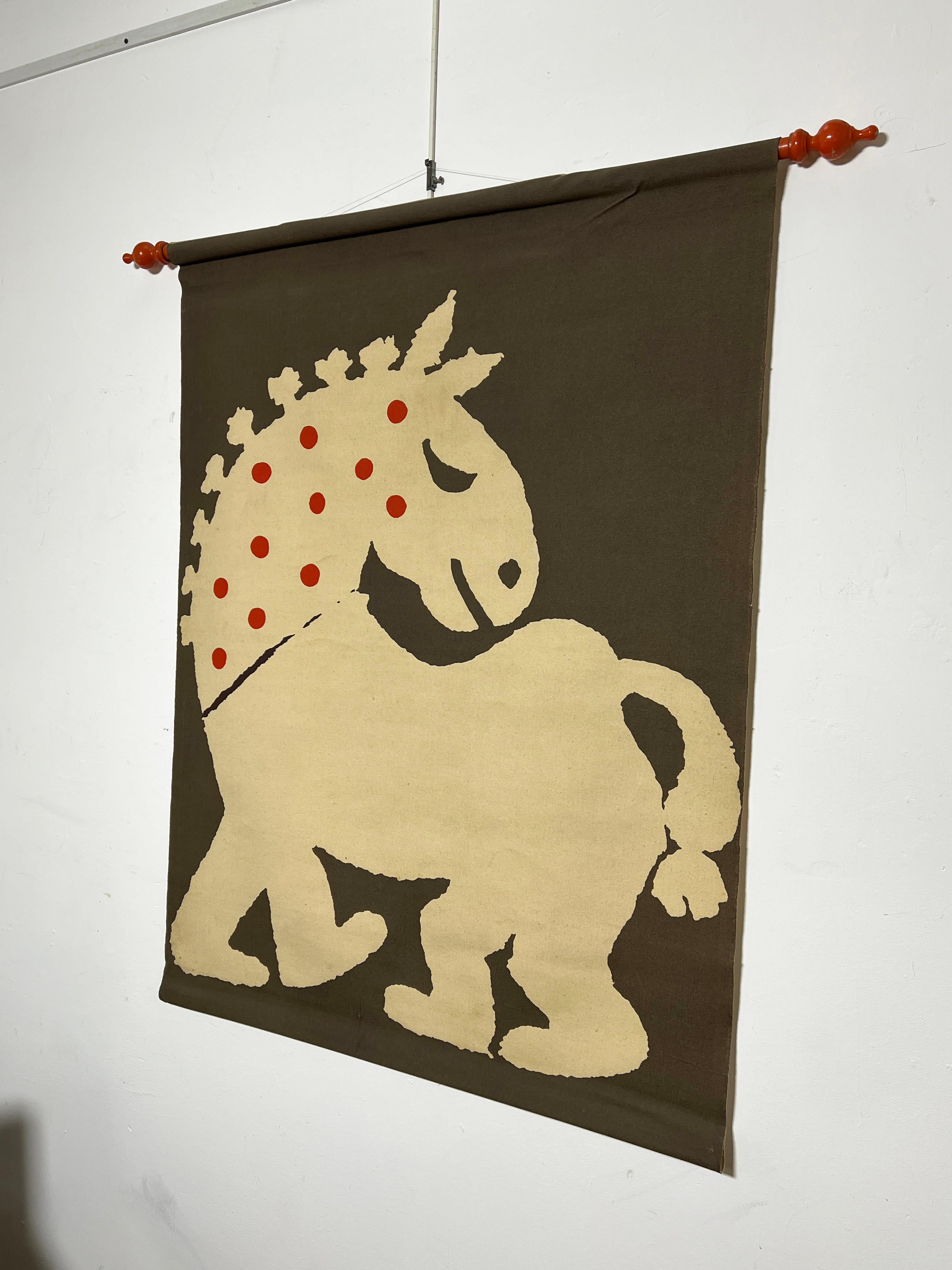 A rare screen printed canvas wall hanging by the respected British graphic artist Abram Games. He designed this whimsical horse as an advertisement for the Times of London in 1962. Games was a contemporary of Alexander Girard and the two shared a