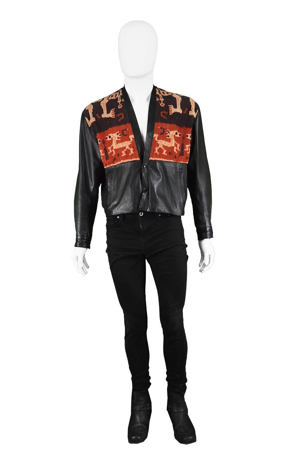 Abrasive Aorta Men's Vintage Leather & Handwoven Ikat Tapestry Jacket, 1980s

Estimated Size: Medium to Large. Please check measurements.
Chest - 44” / 112cm (allow a few inches room for movement)
Waist - 38” / 96cm
Length (Shoulder to Hem) - 21” /