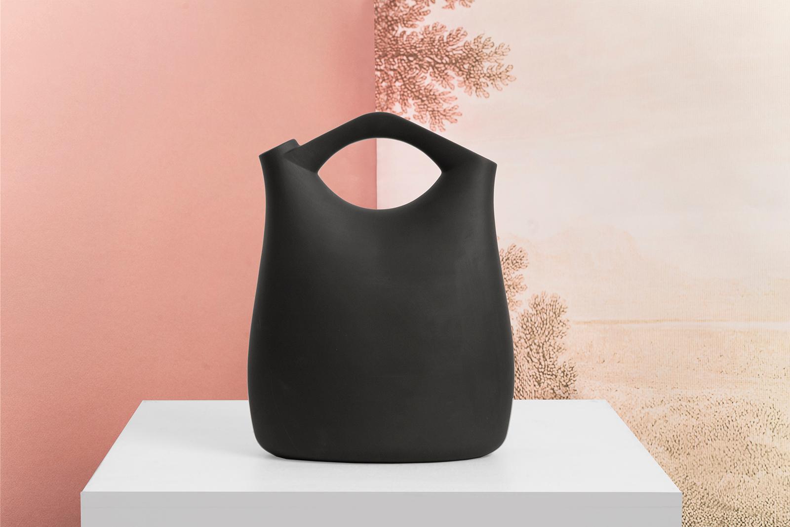 Abrek Black Jug by ZPS Studio
Dimensions: W 24 x D 12.5 x H 31.5 cm
Materials: Matte Glazed Ceramic.

A number of 31 bowls of identical shape, made in limited edition by fine Italian artisans in 31 different materials: Diogenèa - A tale of bowls is