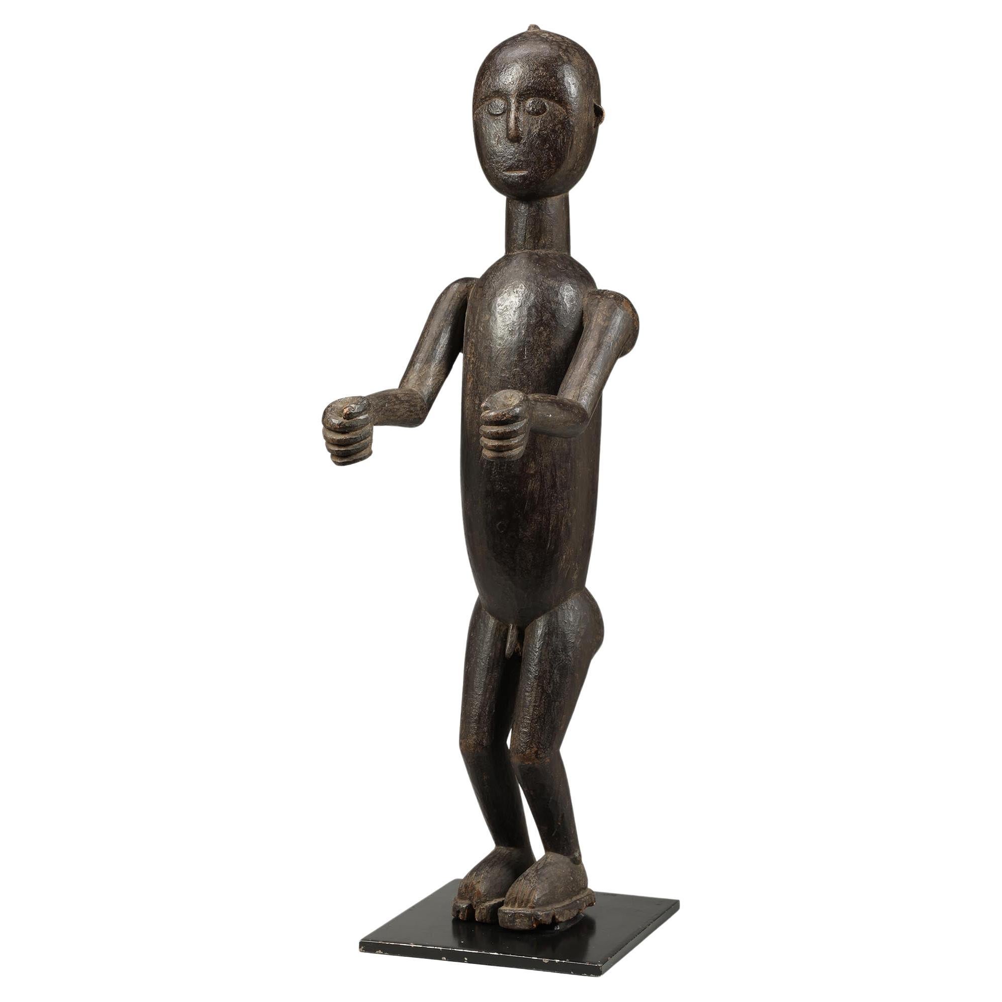 Abron Drum Attendant Standing Figure Arms Out, Ghana, Early 20th Century For Sale