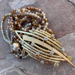 Abstract 1970's Leaf Pendant in Yellow Gold with White, Yellow & Brown Diamonds